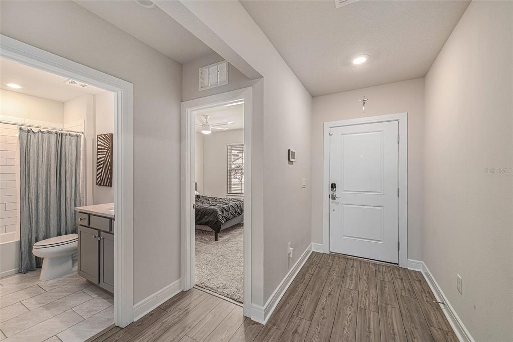 8312 Reefbay Cove Parrish, FL 34221 - Photo 18 of 36 a view of a bathroom with toilet empty and a window