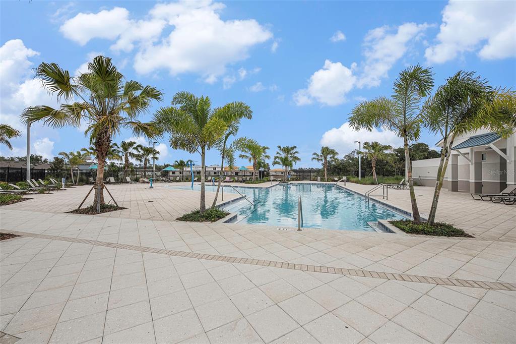 8312 Reefbay Cove Parrish, FL 34221 - Photo 32 of 36 a view of swimming pool with outdoor seating