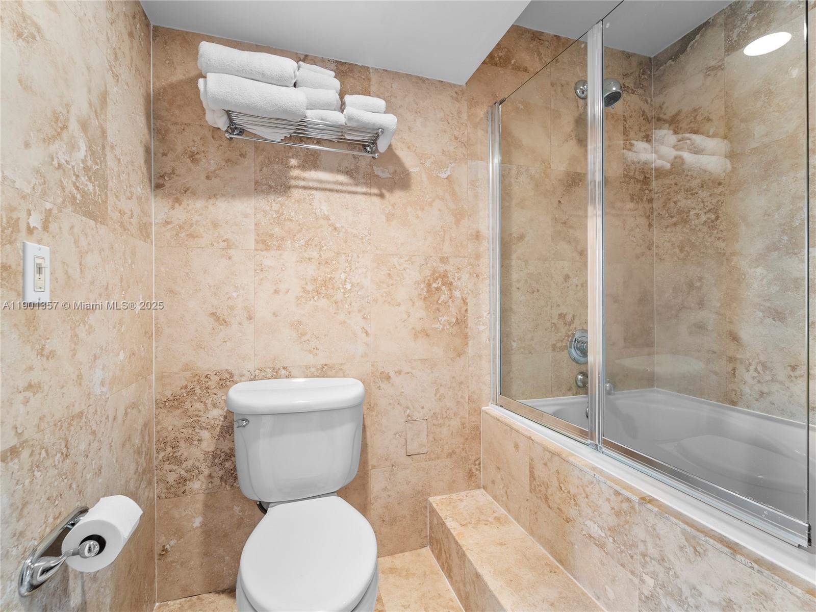 5 Island Avenue, Unit LE Miami Beach, FL 33139 - Photo 13 of 30 a bathroom with a toilet and a shower