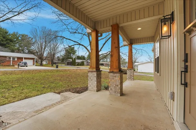 a view of swimming pool with an outdoor seating