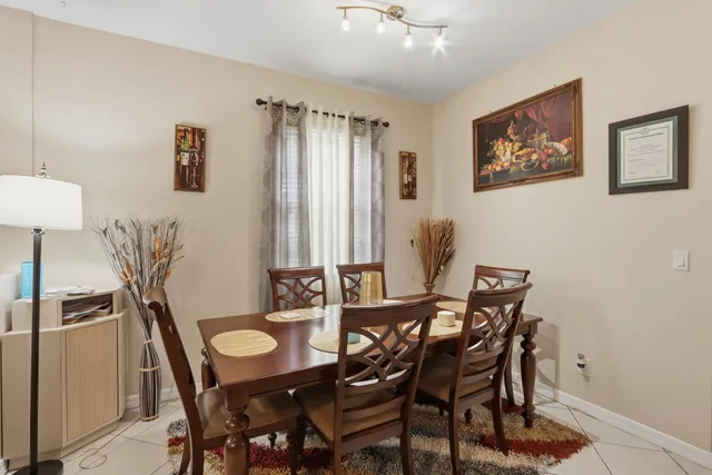 a view of a dining room with furniture