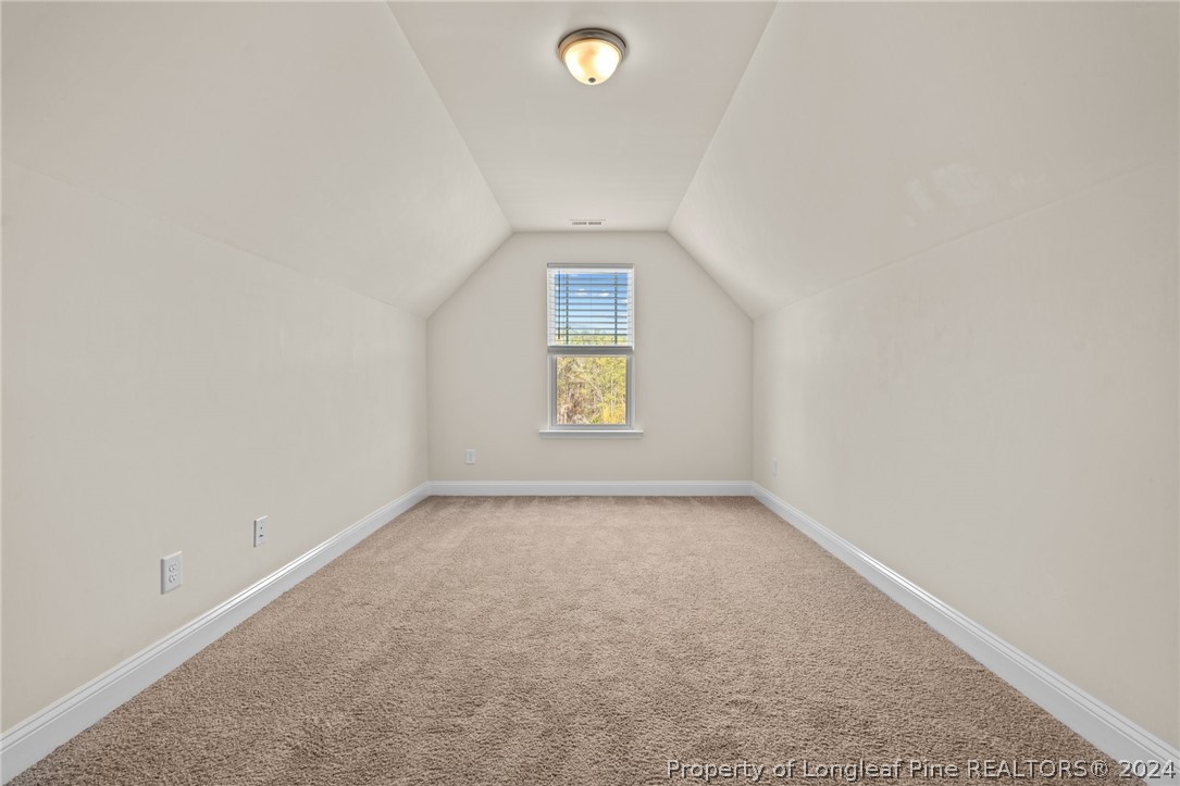 560 Angel Oak Drive Bunnlevel, NC 28323 - Photo 37 of 49 an empty room with windows and closet