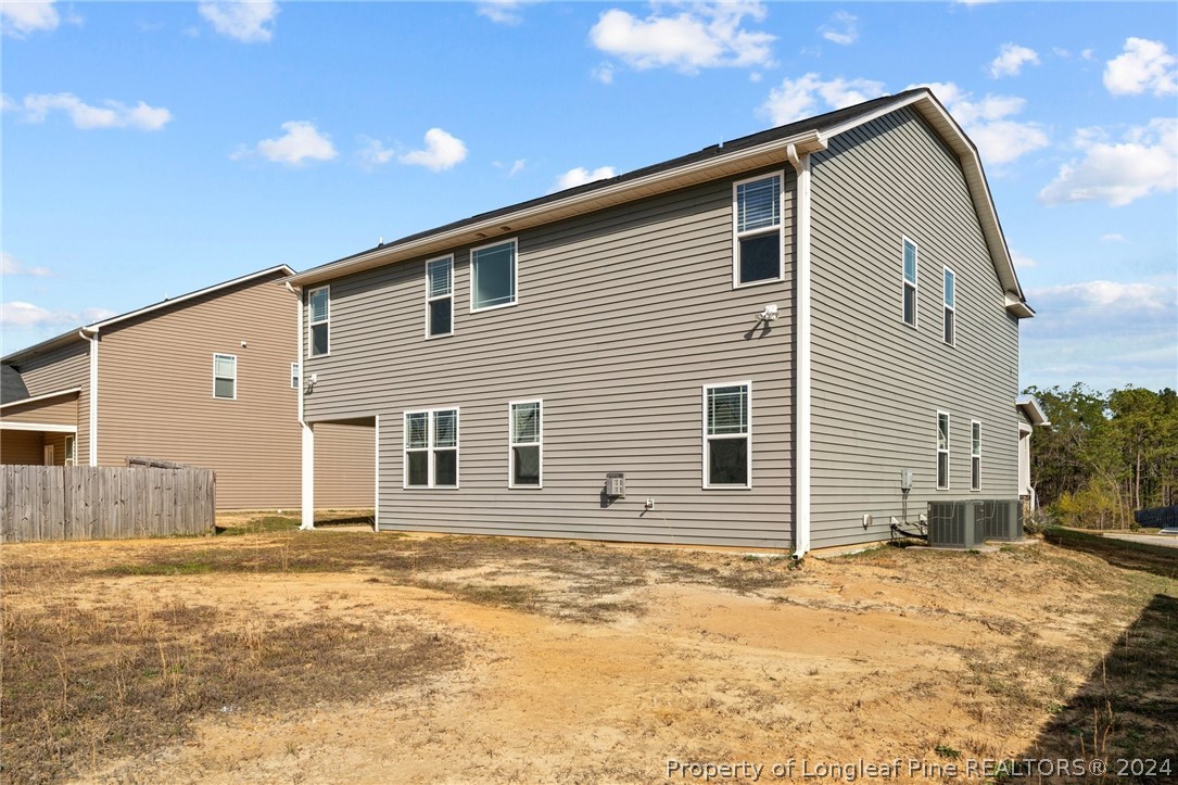 560 Angel Oak Drive Bunnlevel, NC 28323 - Photo 45 of 49 a front view of a house with a yard