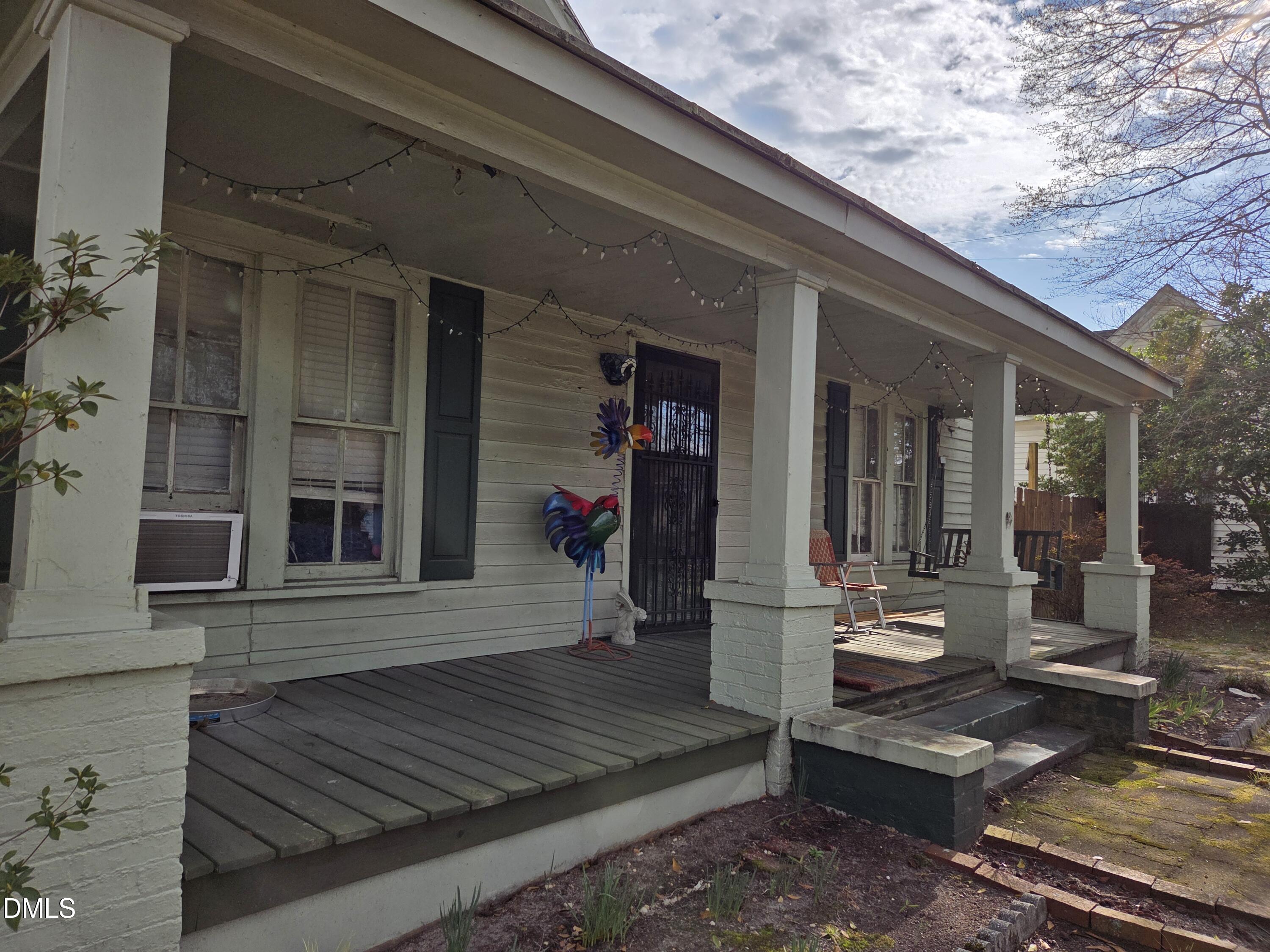 812 West Anderson Street Selma, NC 27576 - Photo 6 of 20 a front view of a house with sitting area