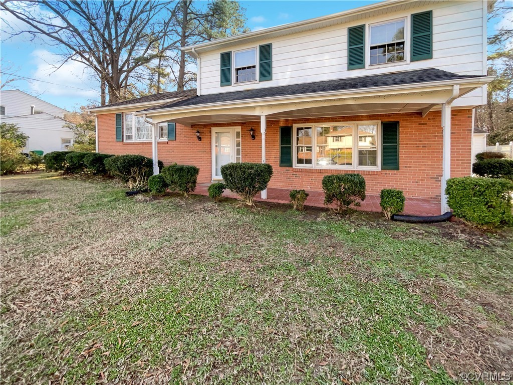1303 Covington Road Colonial Heights, VA 23834 - Photo 1 of 15 a front view of house with yard