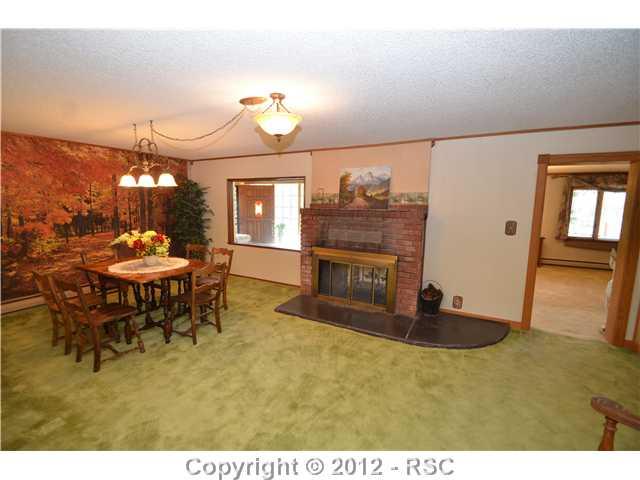 11685 Howells Road Colorado Springs, CO 80908 - Photo 5 of 16 DINING ROOM NEXT TO THE KITCHEN & LIVING ROOM.