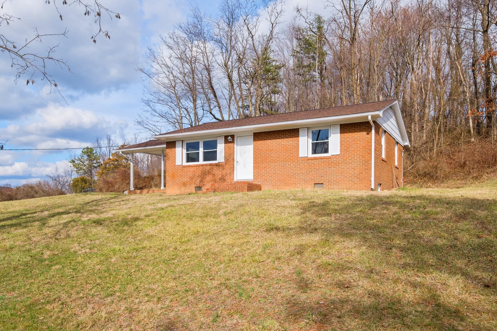 8318 Winestore Road Timberville, VA 22853 - Photo 1 of 33 a view of a house with a yard