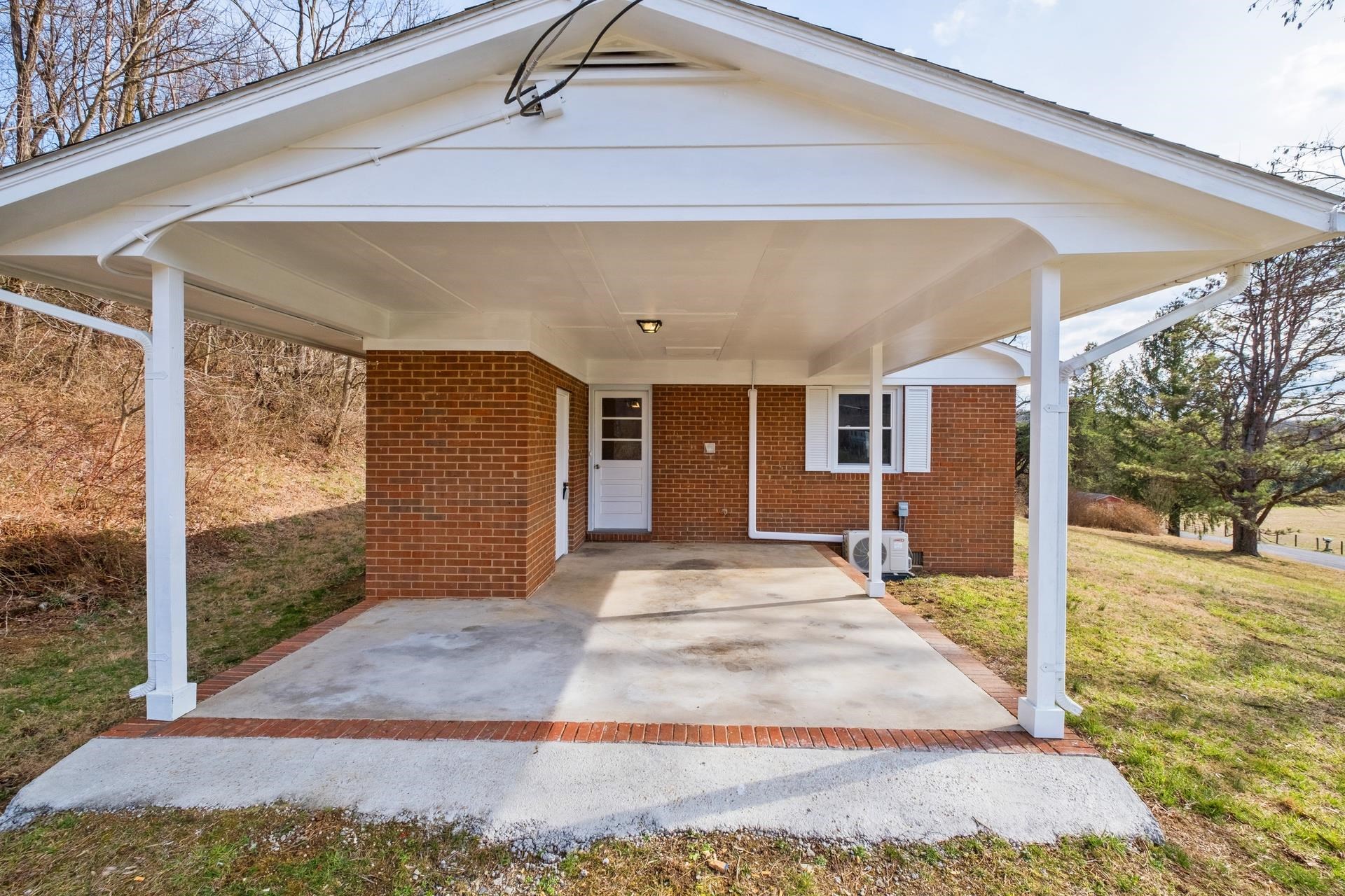 8318 Winestore Road Timberville, VA 22853 - Photo 13 of 33 a front view of a house with a yard