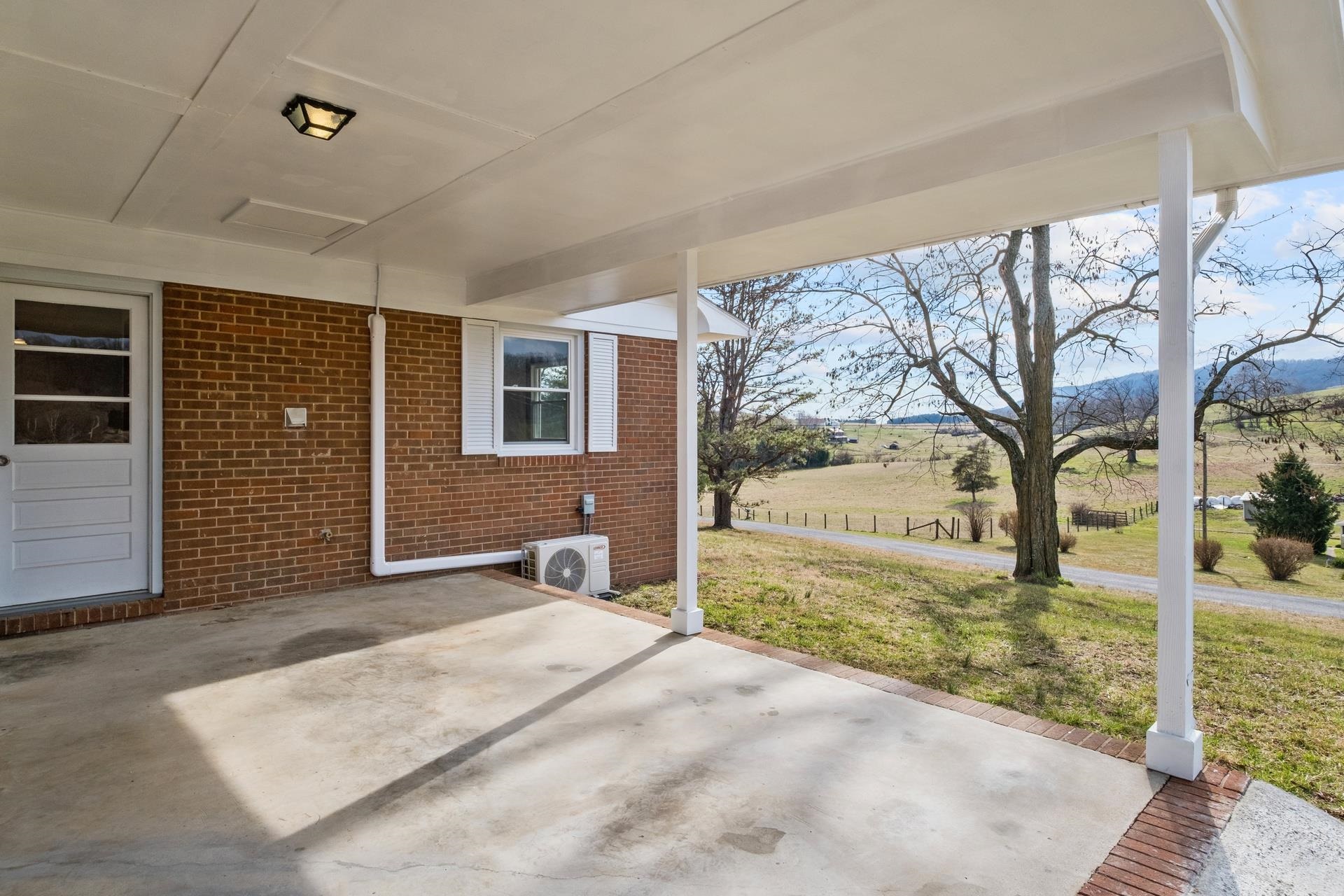 8318 Winestore Road Timberville, VA 22853 - Photo 14 of 33 a view of a house with backyard and tree