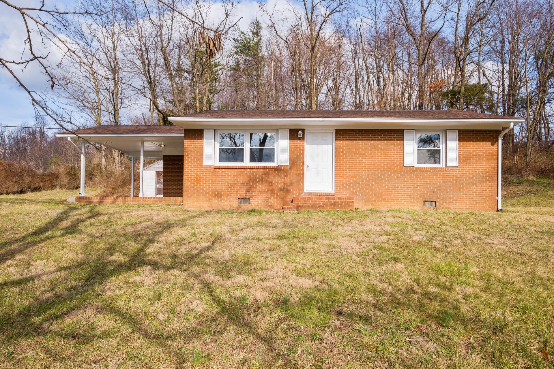 8318 Winestore Road Timberville, VA 22853 - Photo 2 of 33 front view of house with a yard