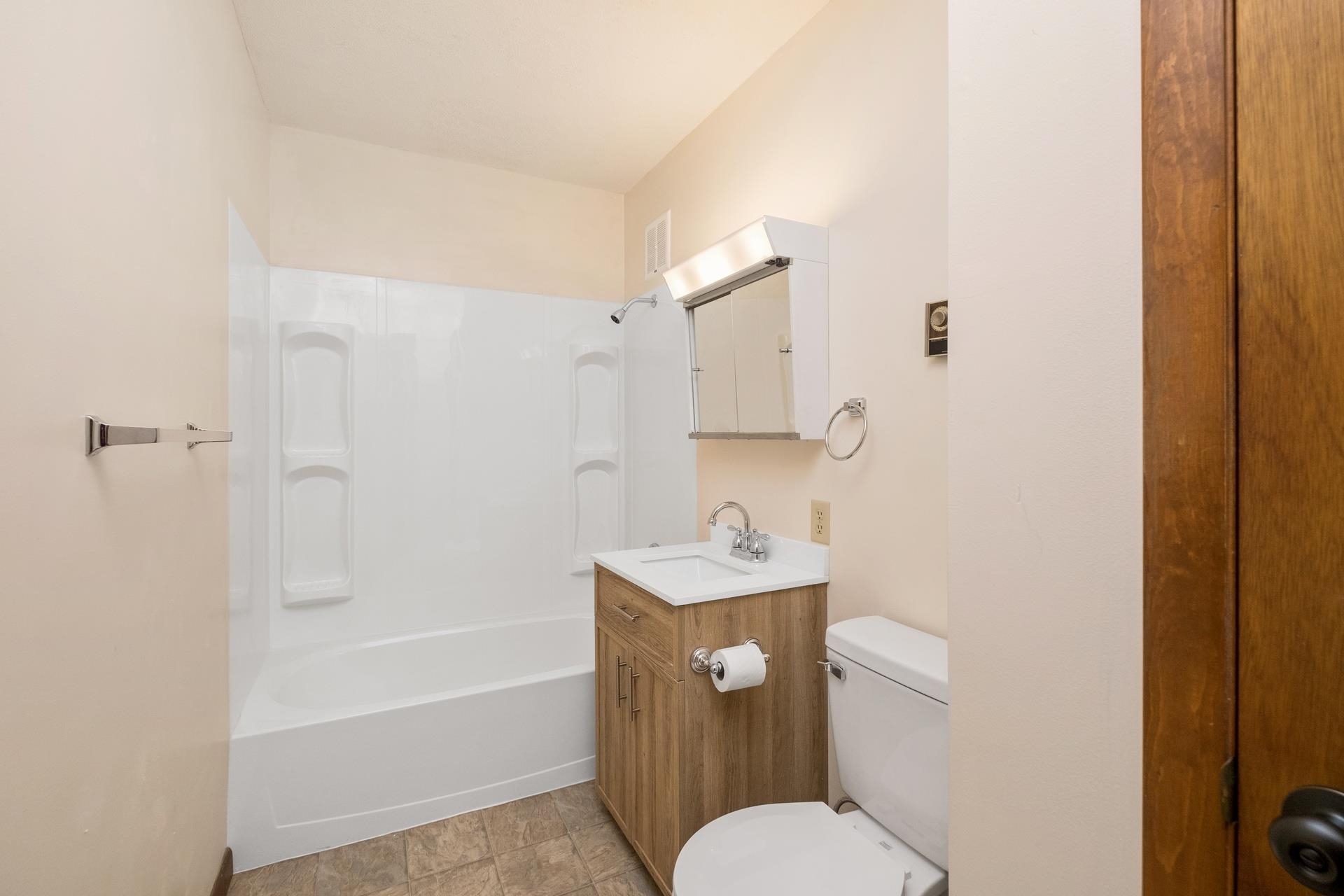 8318 Winestore Road Timberville, VA 22853 - Photo 24 of 33 a bathroom with a sink toilet and shower