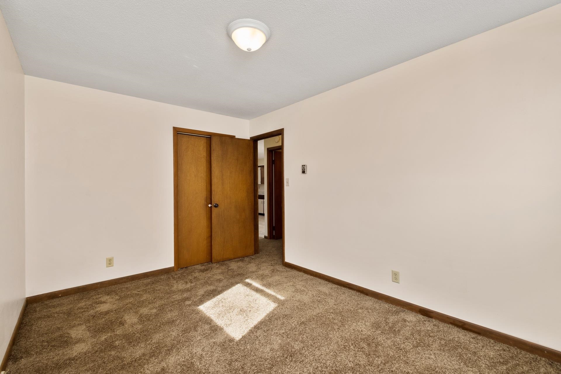 8318 Winestore Road Timberville, VA 22853 - Photo 27 of 33 an empty room with closet