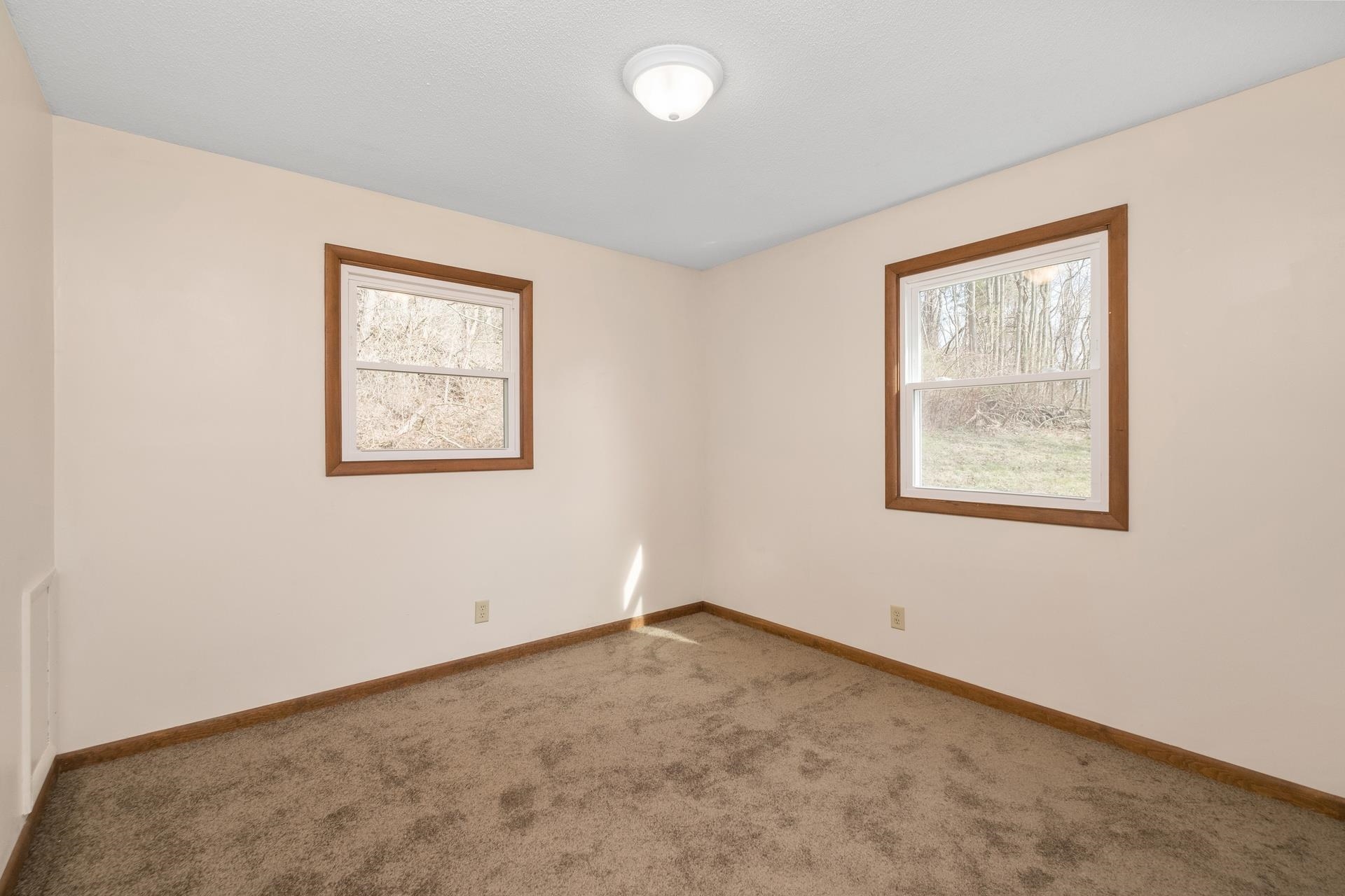 8318 Winestore Road Timberville, VA 22853 - Photo 29 of 33 an empty room with windows