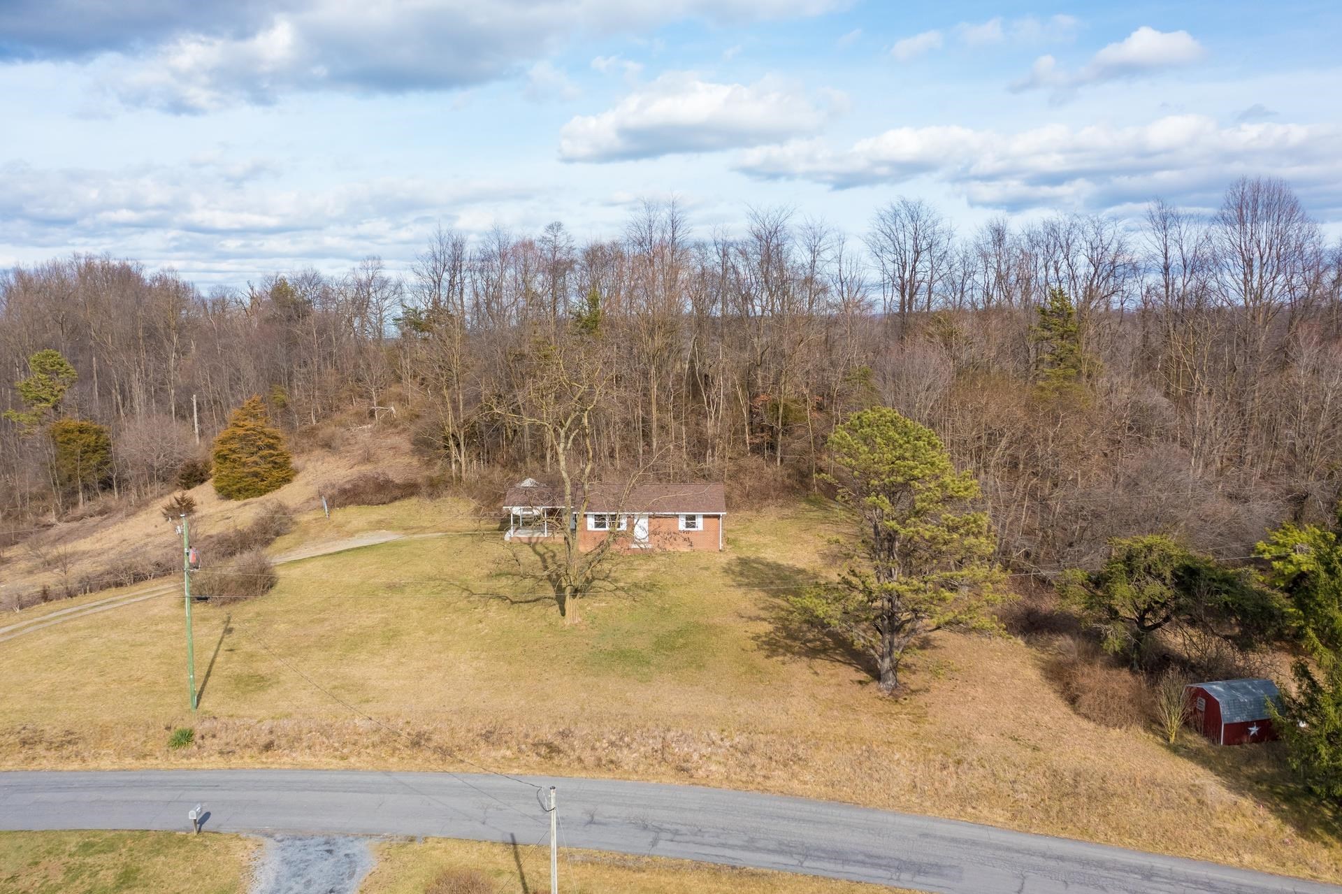 8318 Winestore Road Timberville, VA 22853 - Photo 6 of 33 a view of a yard with an outdoor space