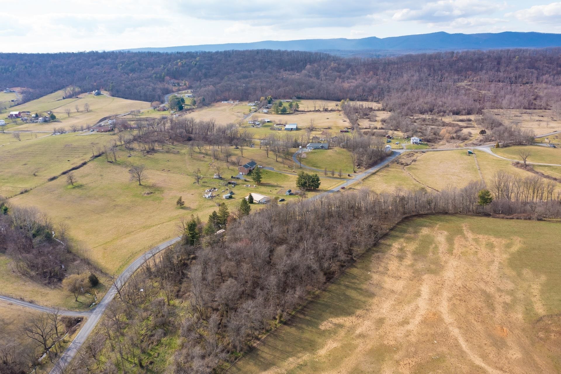 8318 Winestore Road Timberville, VA 22853 - Photo 10 of 33 a view of building with an outdoor space