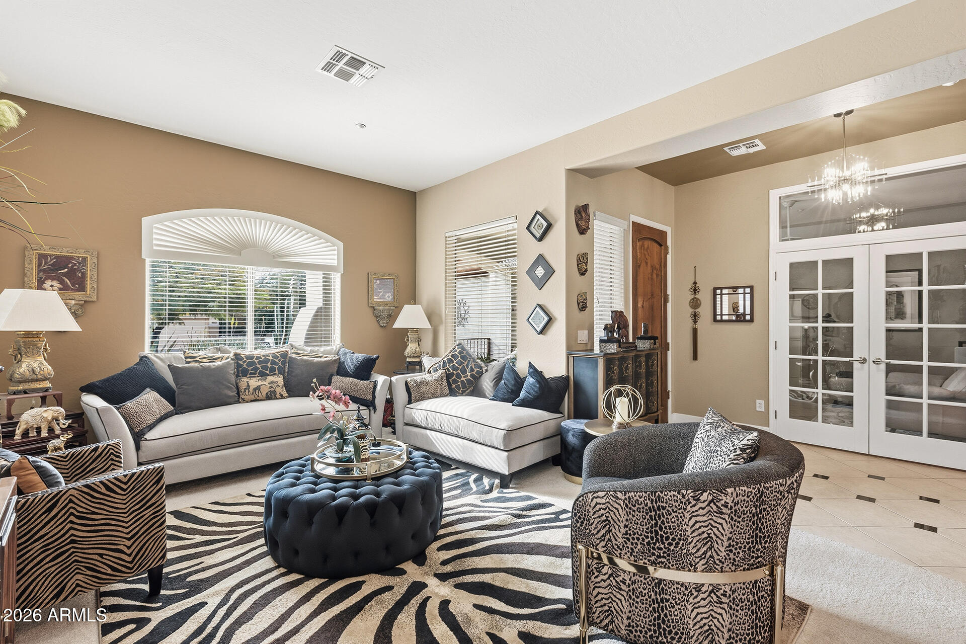 41712 North Golf Crest Road Anthem, AZ 85086 - Photo 12 of 39 a living room with furniture and a large window