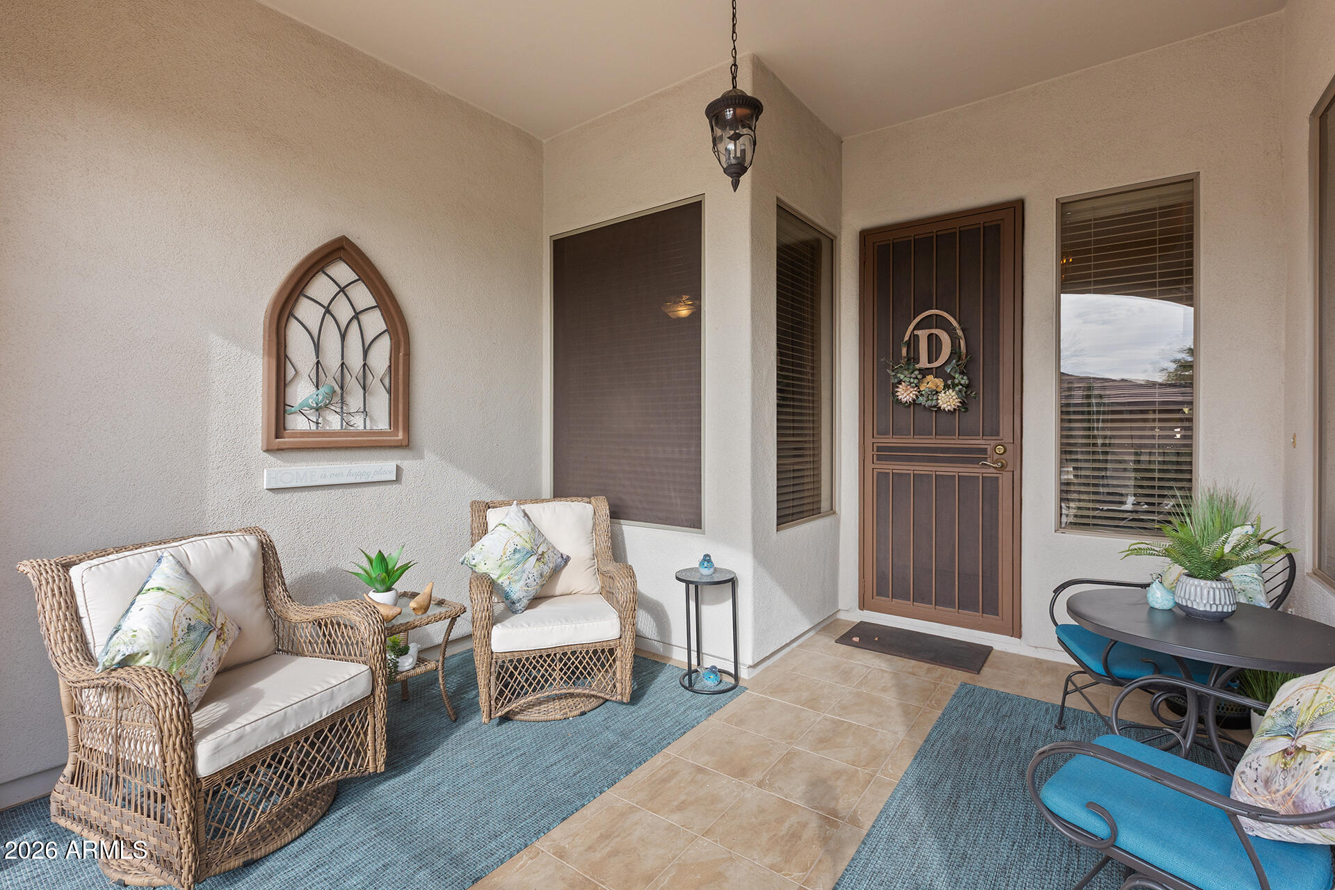 41712 North Golf Crest Road Anthem, AZ 85086 - Photo 2 of 39 a living room with furniture and wooden floor