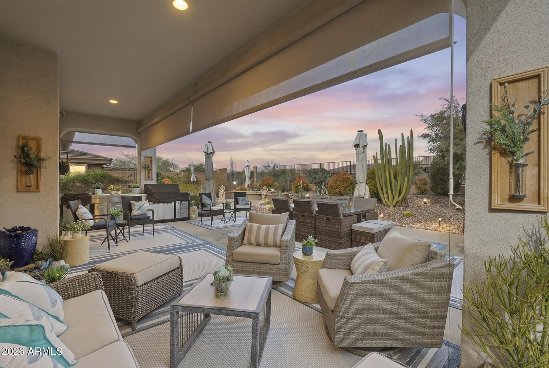 41712 North Golf Crest Road Anthem, AZ 85086 - Photo 23 of 39 a view of a patio with couches and chairs