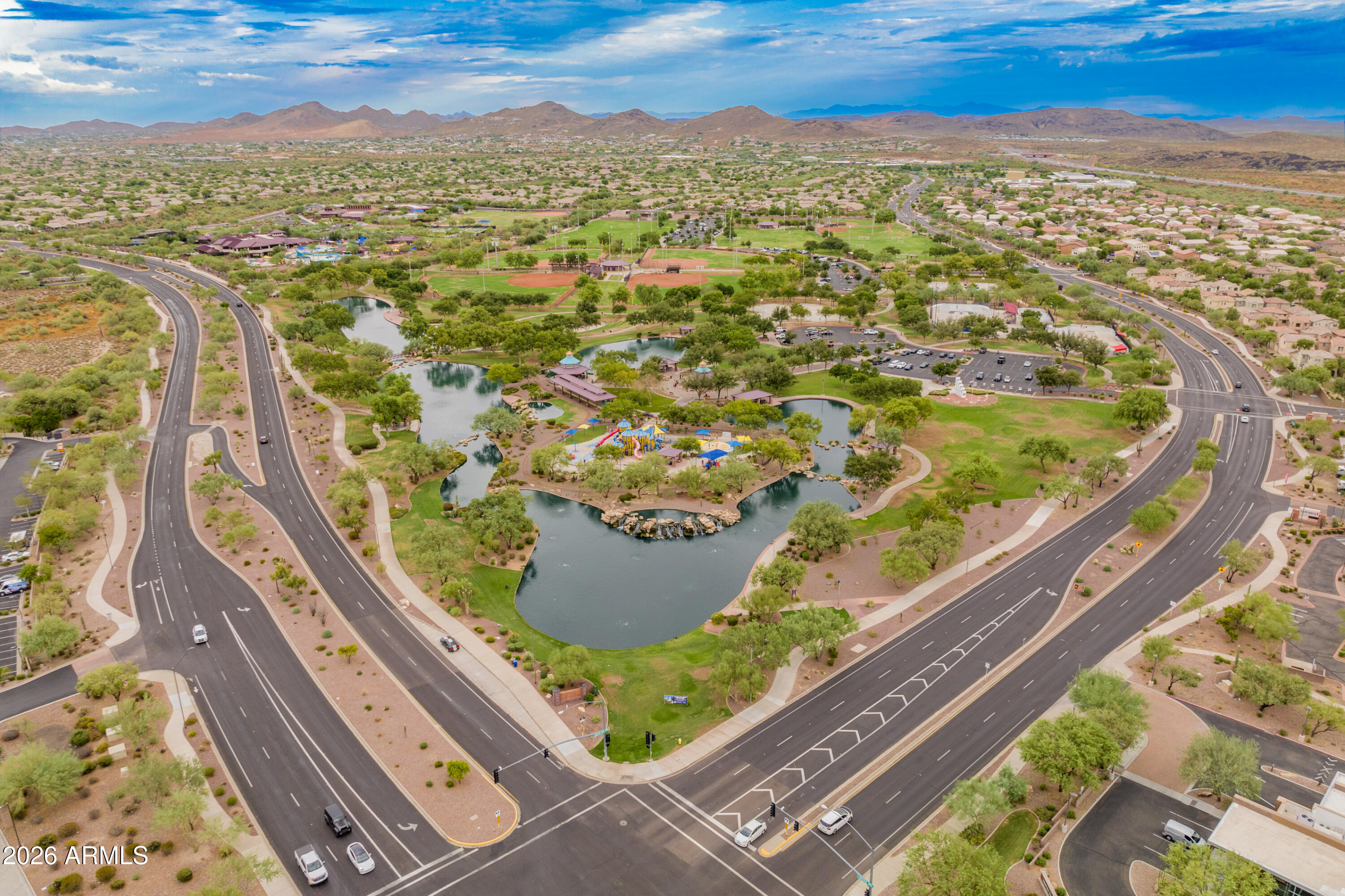 41712 North Golf Crest Road Anthem, AZ 85086 - Photo 37 of 39 an aerial view of residential houses with outdoor space