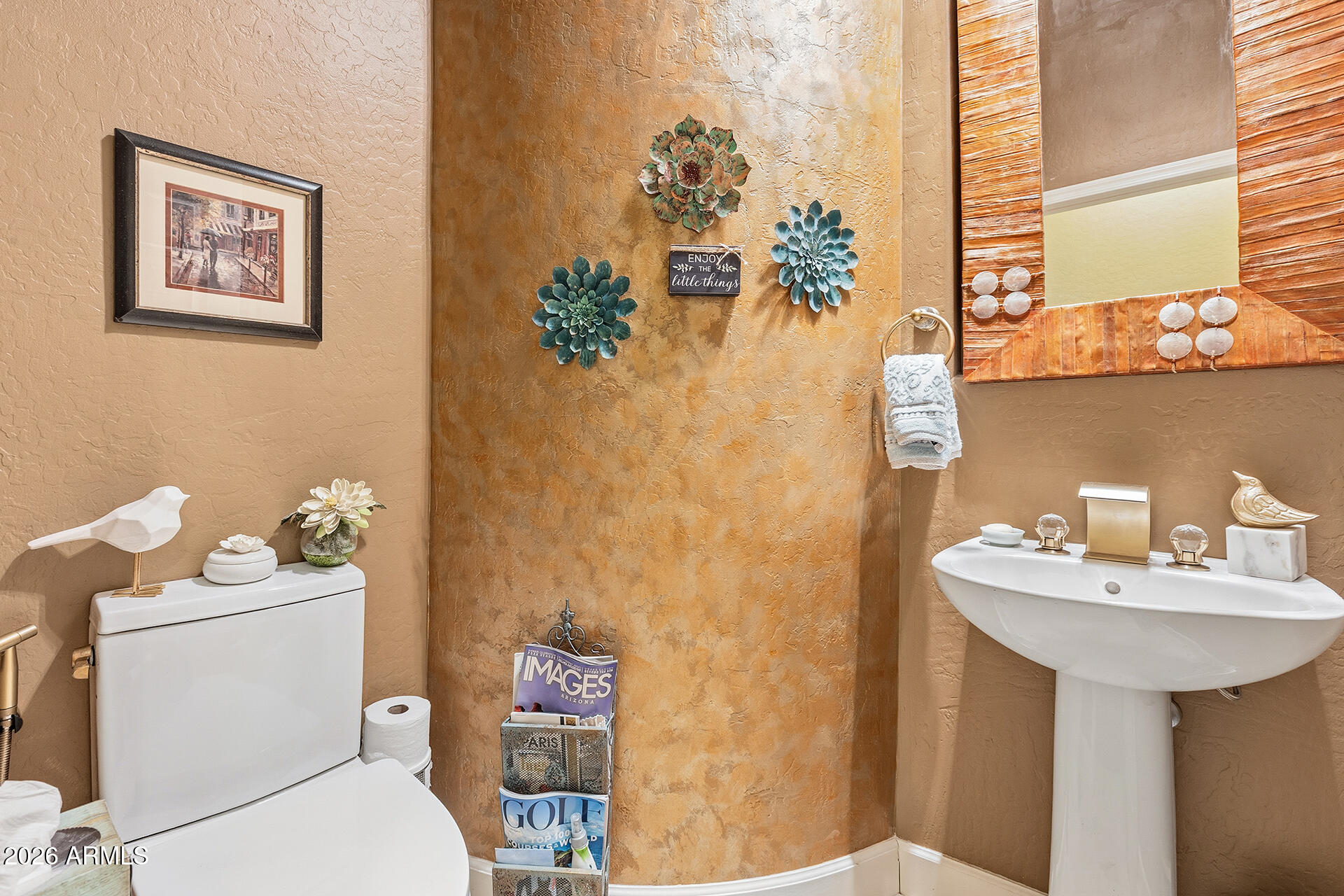 41712 North Golf Crest Road Anthem, AZ 85086 - Photo 10 of 39 a bathroom with a sink mirror and toilet