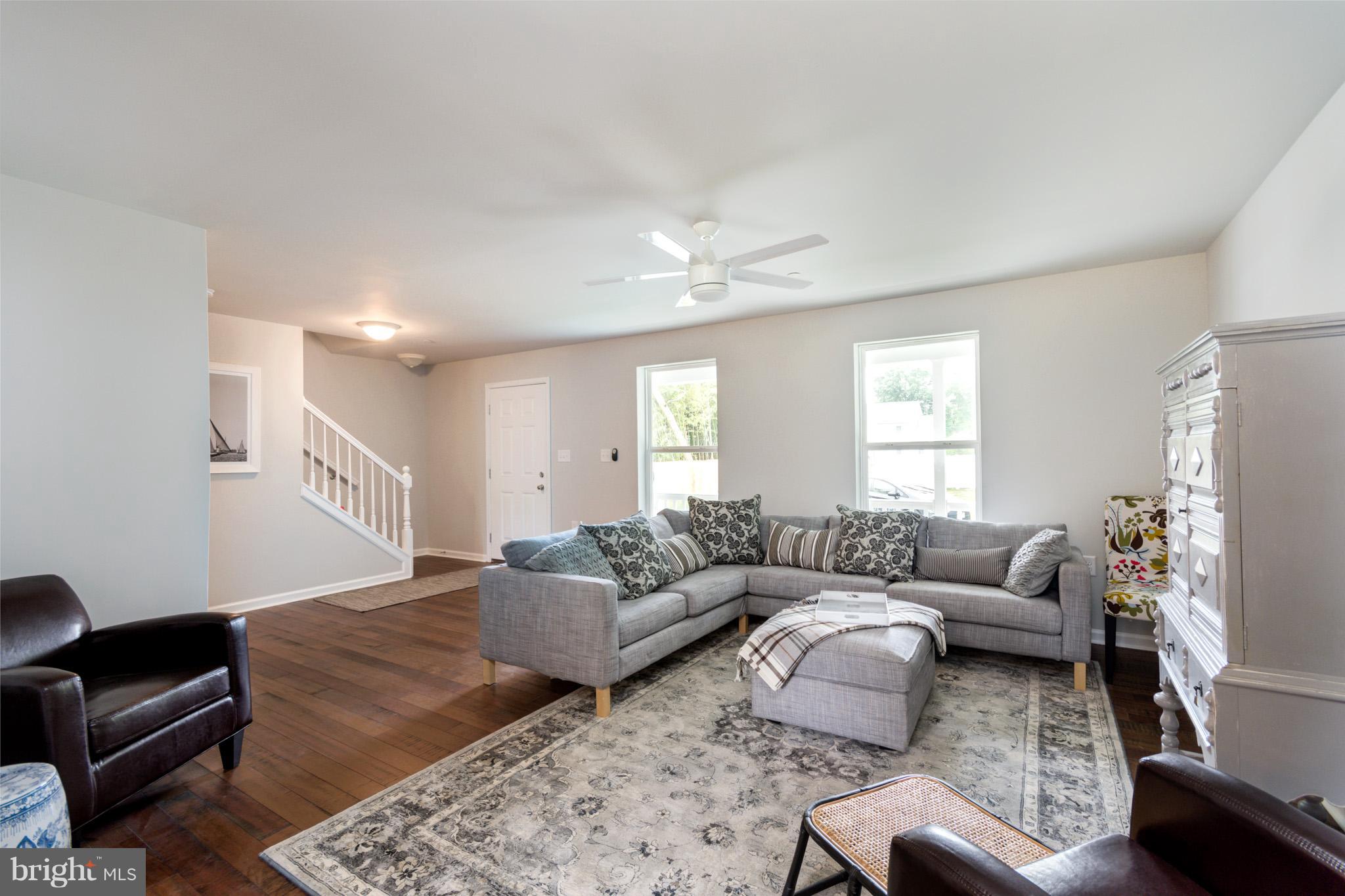 8035 Clark Station Road Severn, MD 21144 - Photo 5 of 24 a living room with furniture and a couch