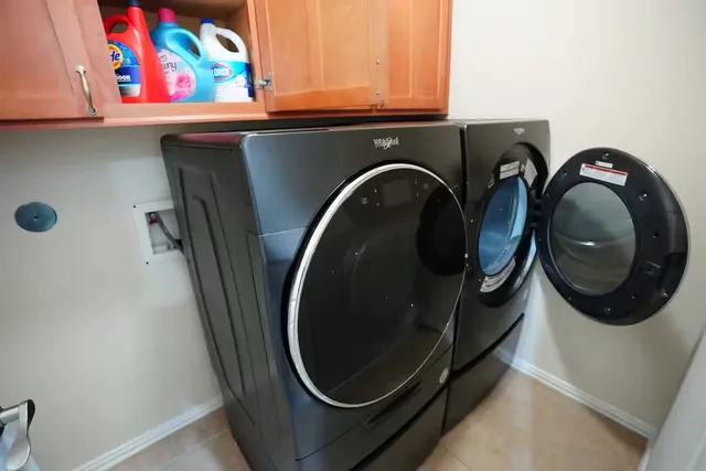 a view of balcony with wooden floor and outdoor seating