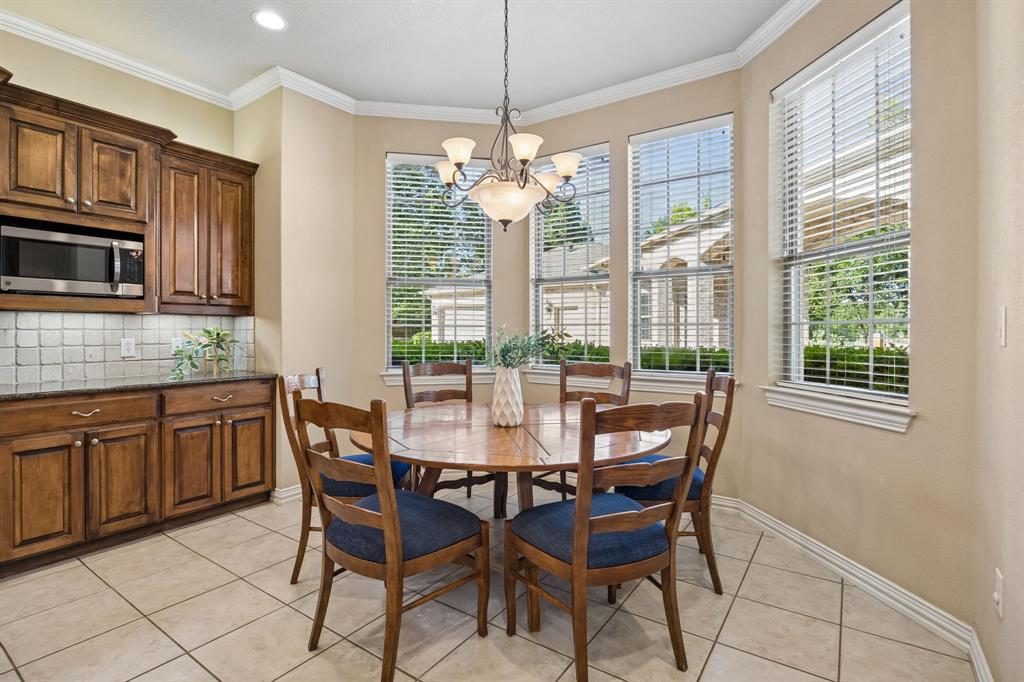 1135 Copper Canyon Road Copper Canyon, TX 76226 - Photo 20 of 40 Light-Filled Breakfast Nook Featuring Bay Windows