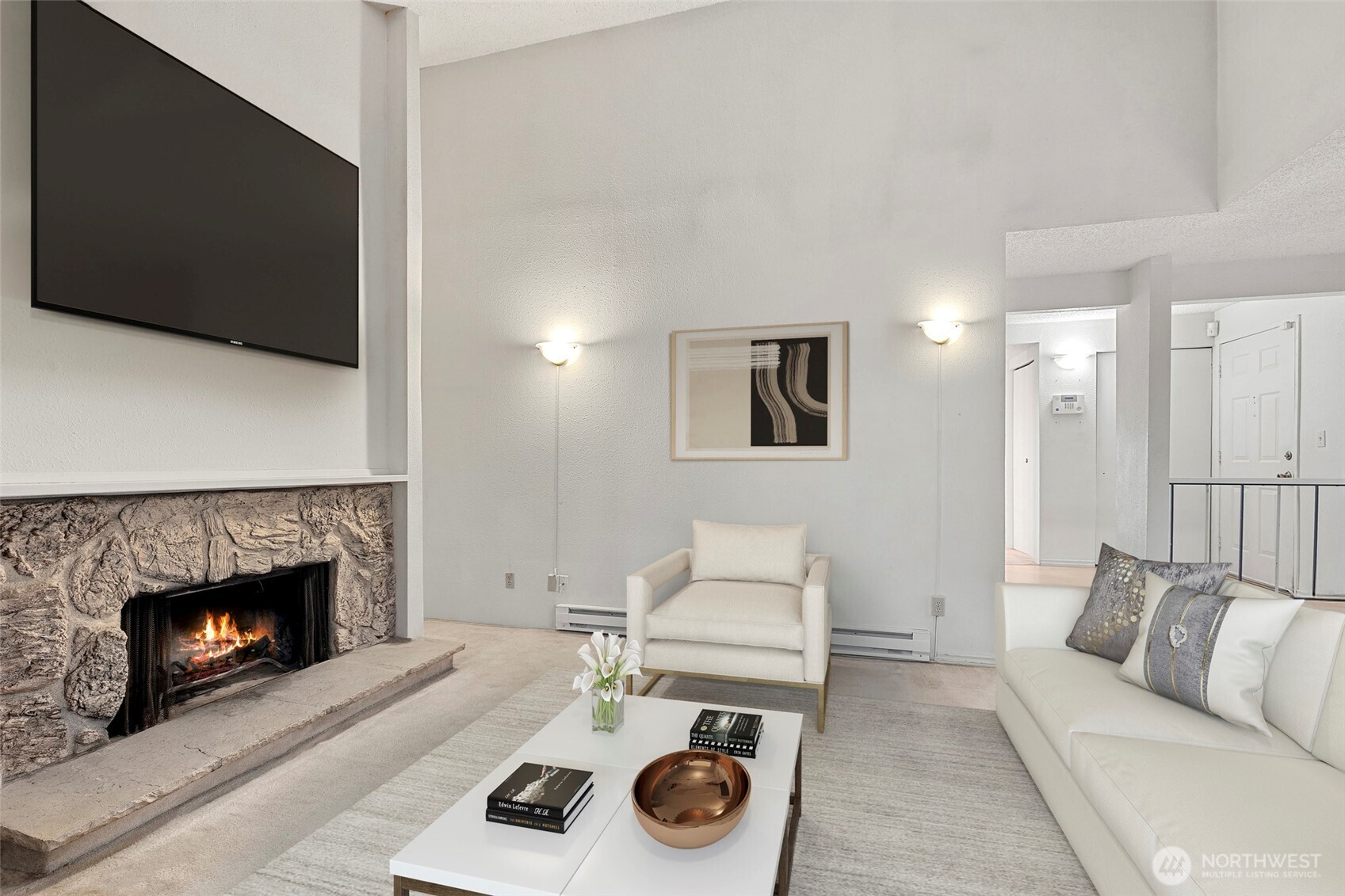 17514 151st Avenue Southeast, Unit I16 Renton, WA 98058 - Photo 5 of 16 a living room with furniture and a fireplace