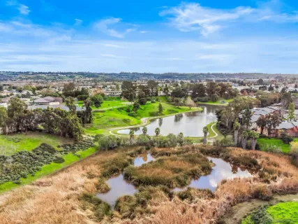 a view of a city with ocean view