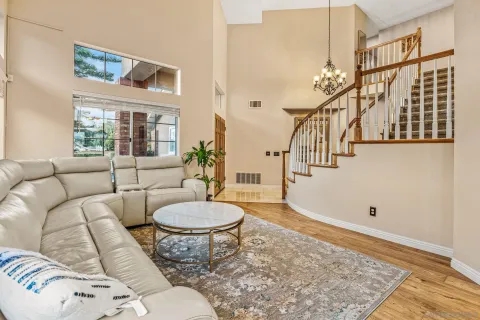a living room with furniture and a table
