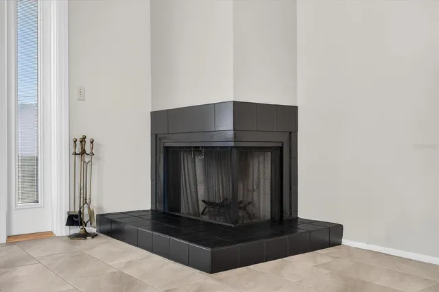 a living room with a fireplace