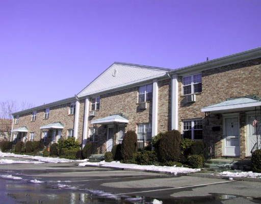 a front view of a building with street view