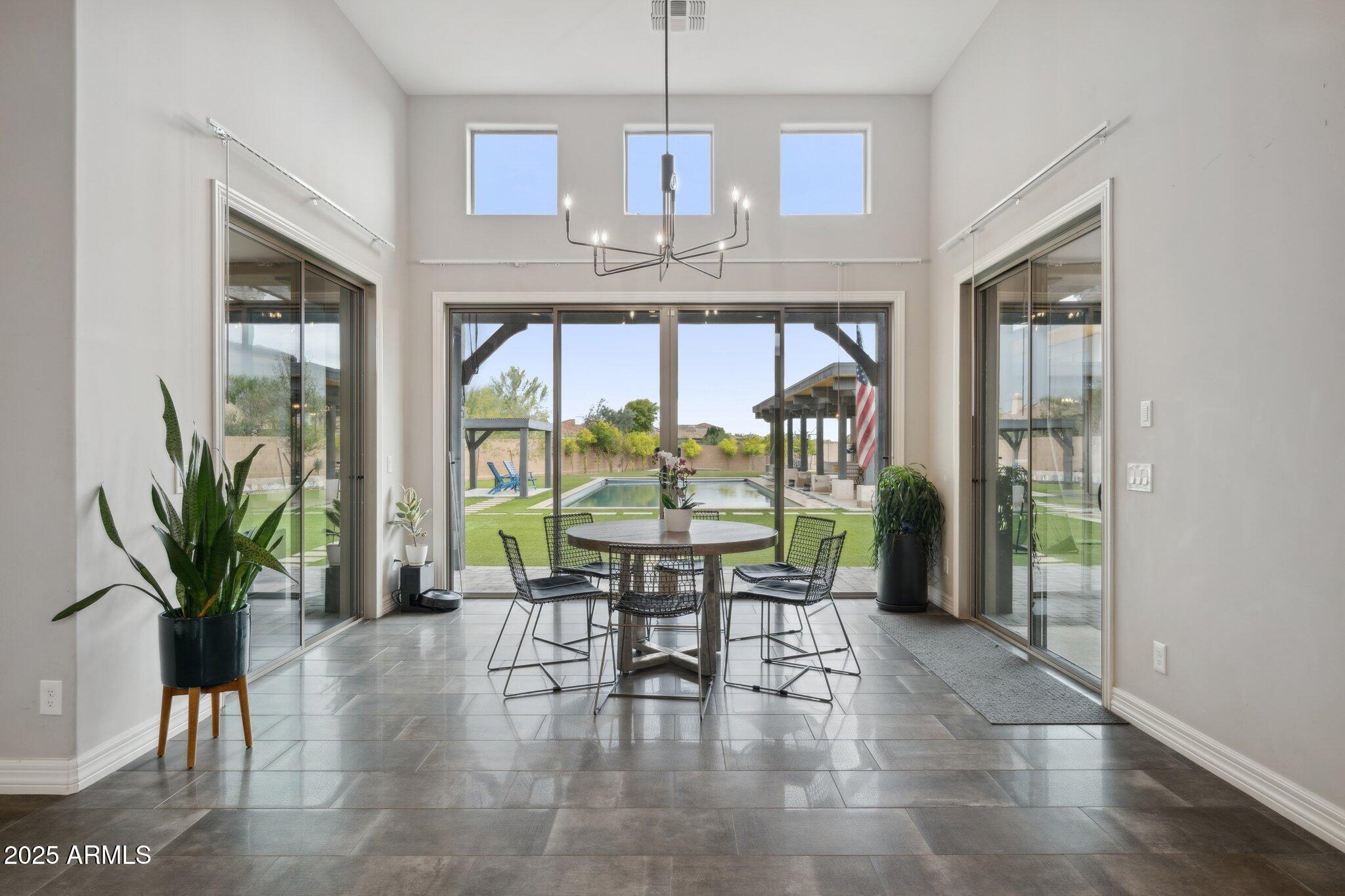 5237 East Montgomery Road Cave Creek, AZ 85331 - Photo 15 of 79 a view of a dining room with furniture window and outside view