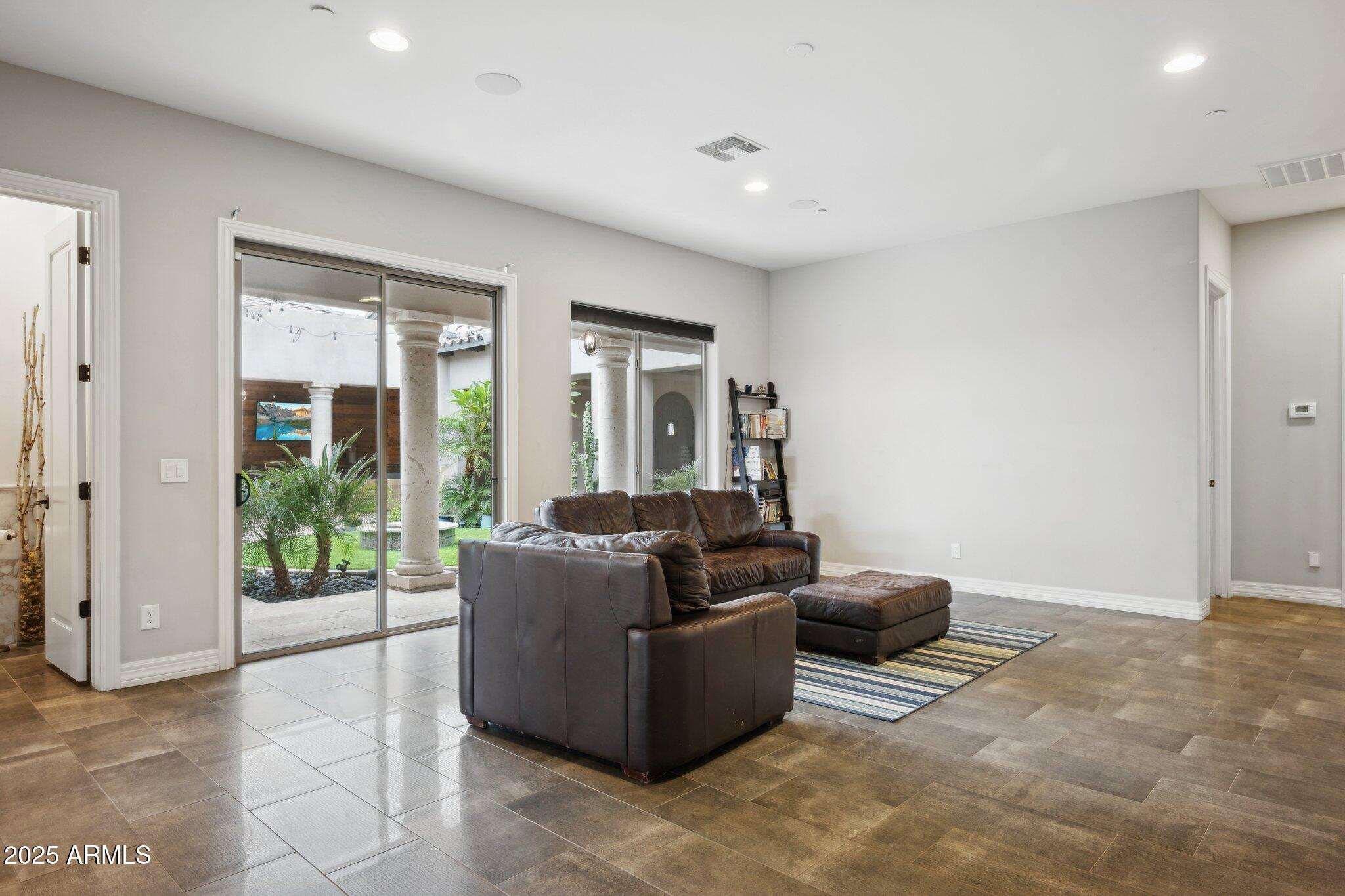 5237 East Montgomery Road Cave Creek, AZ 85331 - Photo 25 of 79 a living room with furniture and a window