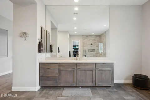 a bedroom with a bed and a book shelf