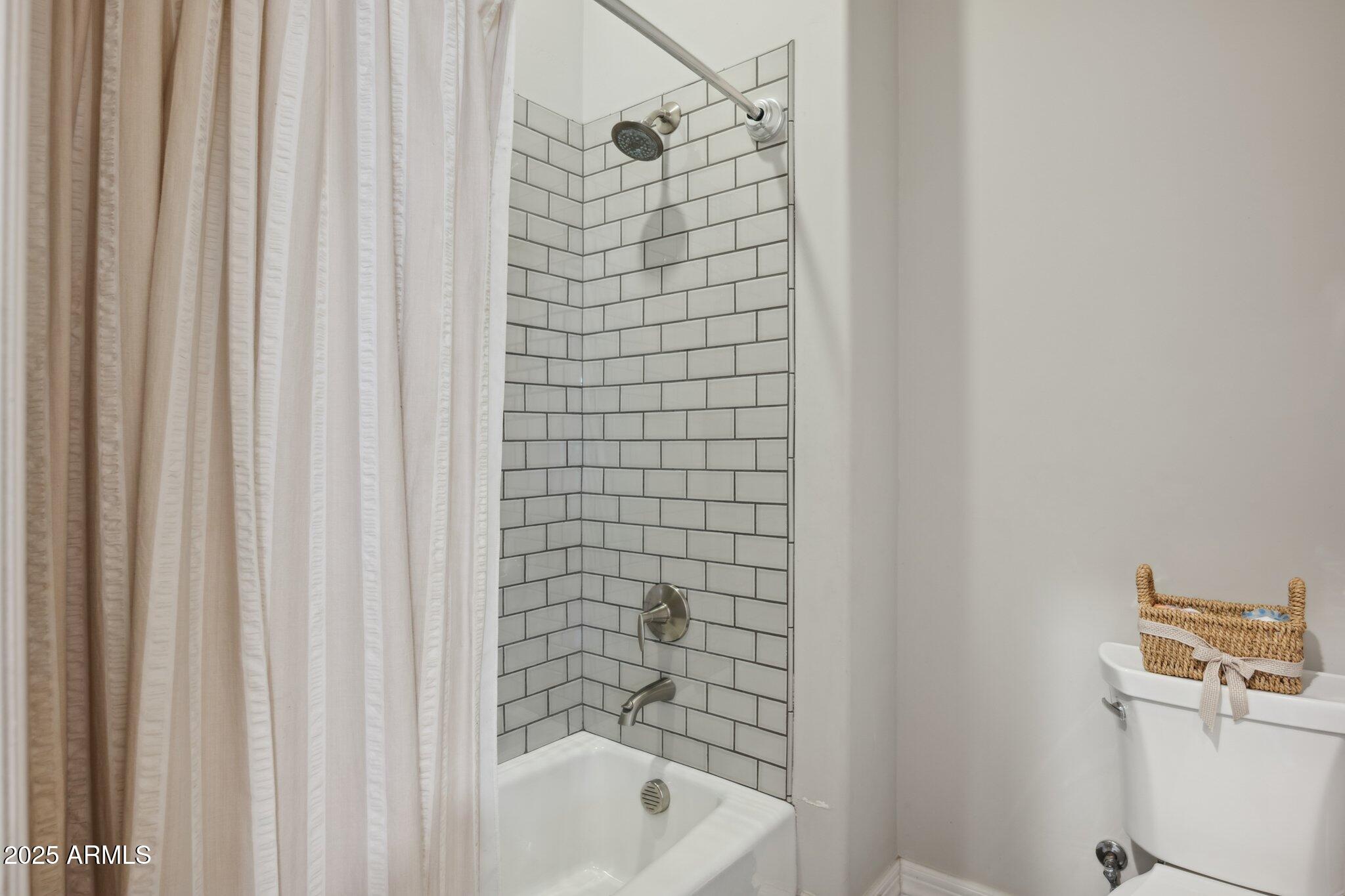 5237 East Montgomery Road Cave Creek, AZ 85331 - Photo 38 of 79 a bathroom with a shower and a bath tub