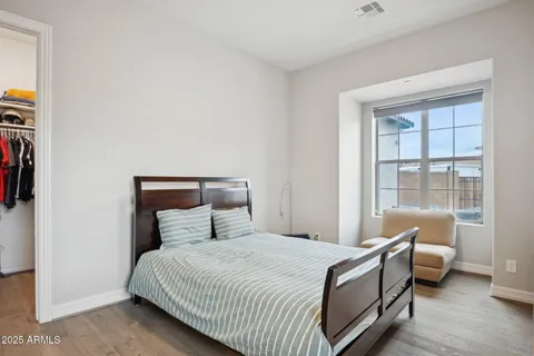 a view of a big house with a big yard and a large window
