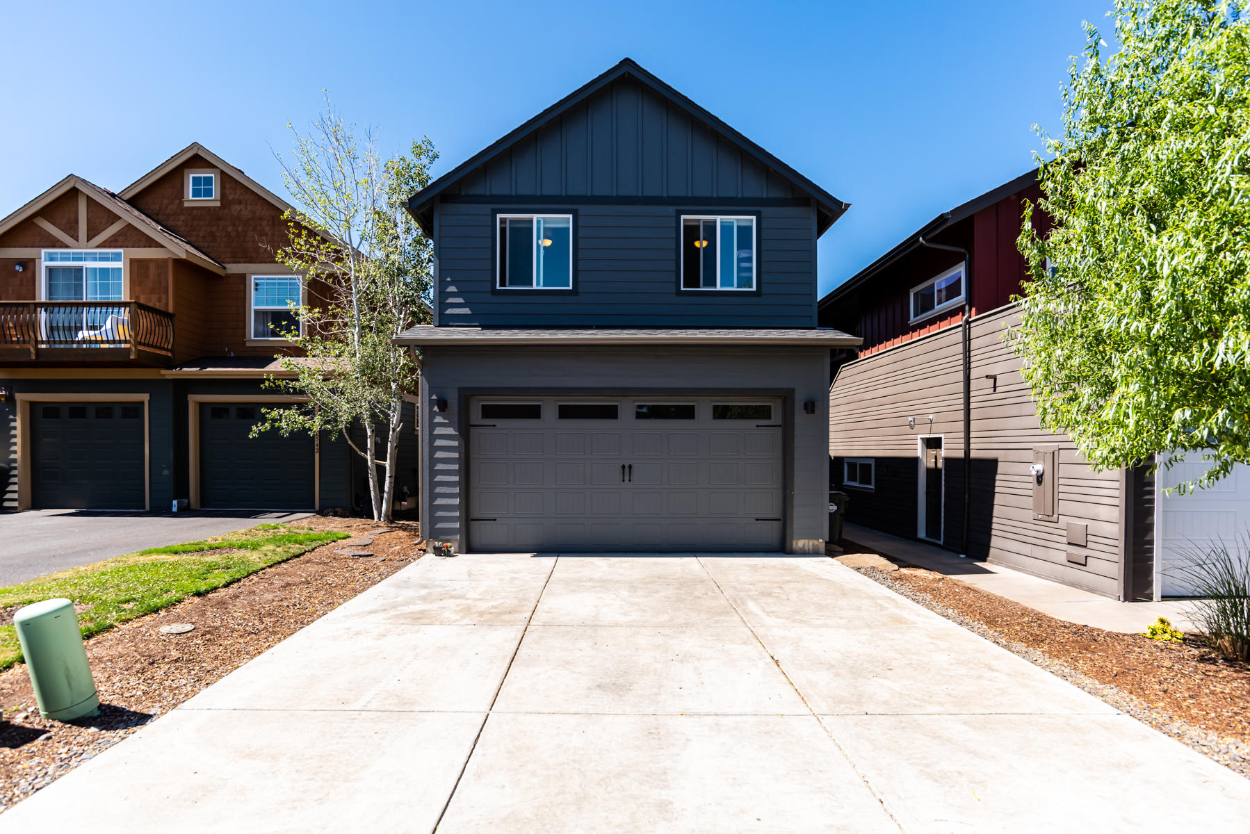 2546 Northwest Awbrey Road Bend, OR 97703 - Photo 20 of 22 a front view of a house with a yard and garage