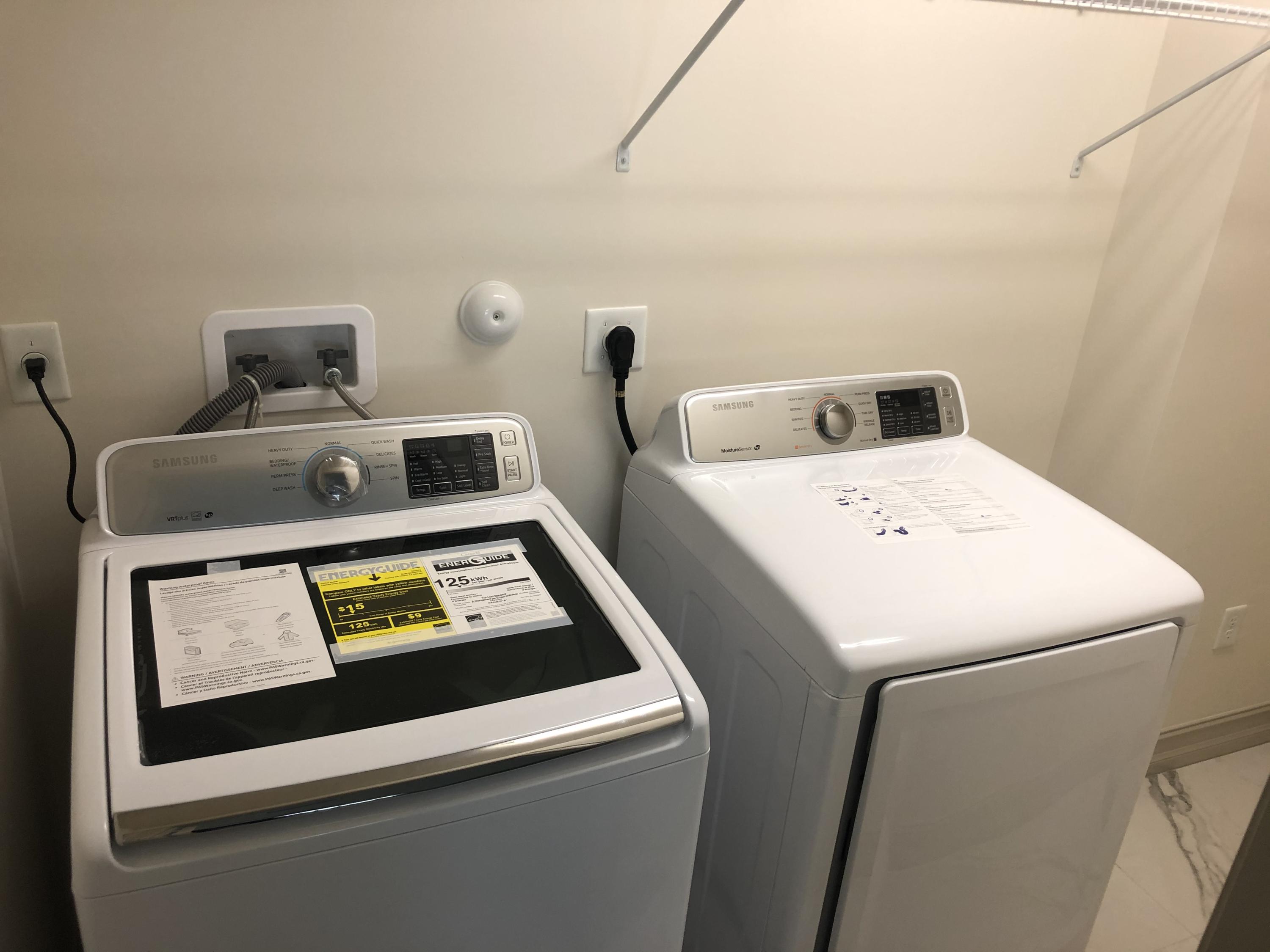 4936 Jefferson Road Delray Beach, FL 33445 - Photo 8 of 16 a utility room with dryer and washer