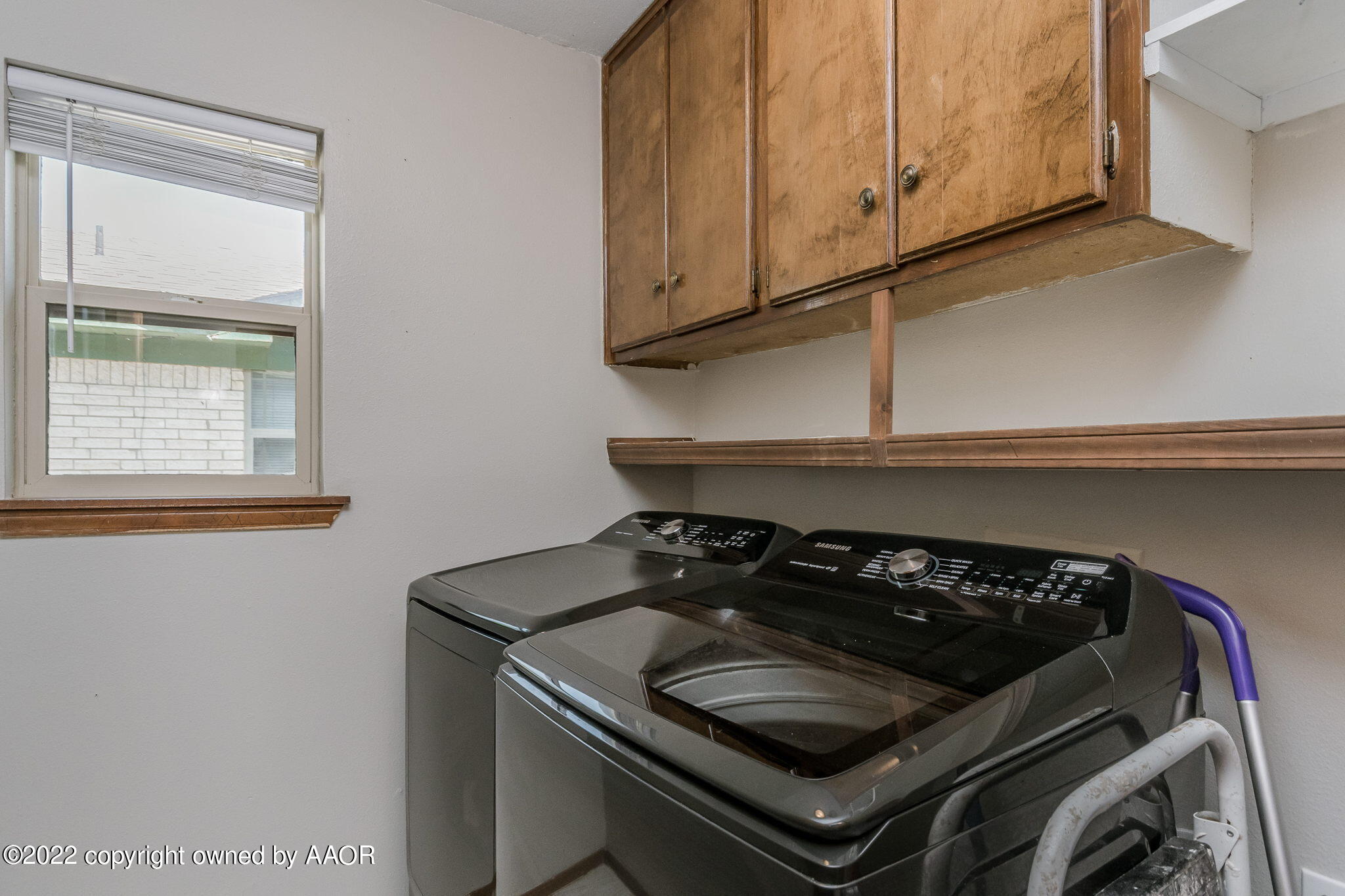 8205 Lamount Drive Amarillo, TX 79110 - Photo 11 of 21 a stove top oven sitting inside of a kitchen