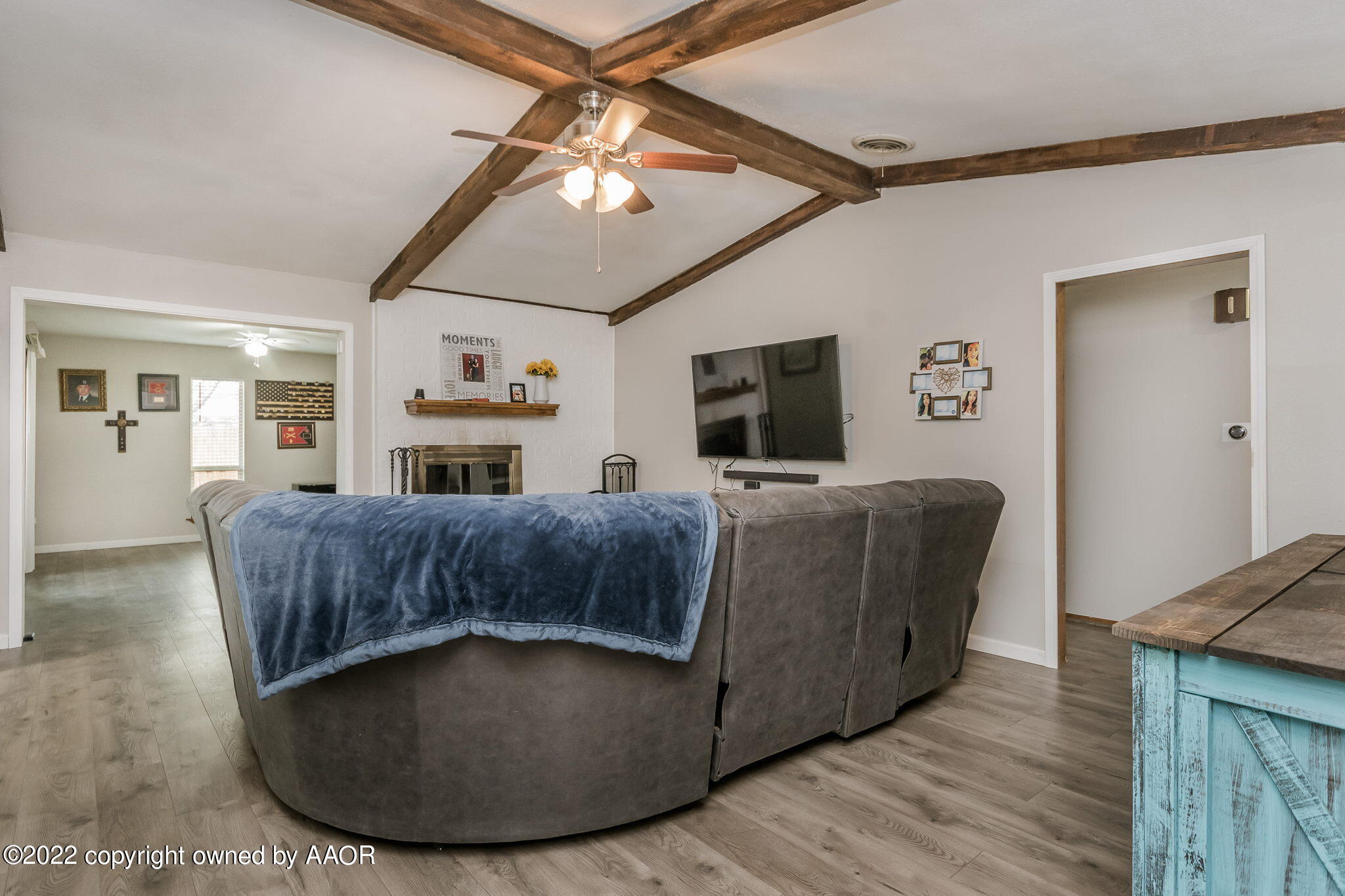 8205 Lamount Drive Amarillo, TX 79110 - Photo 2 of 21 a living room with furniture and a flat screen tv