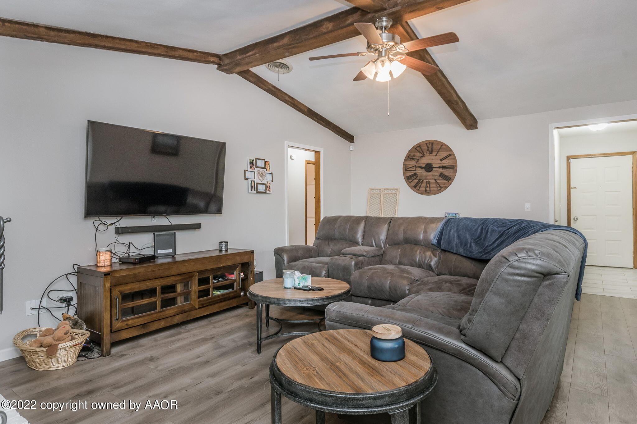 8205 Lamount Drive Amarillo, TX 79110 - Photo 3 of 21 a living room with furniture and a flat screen tv