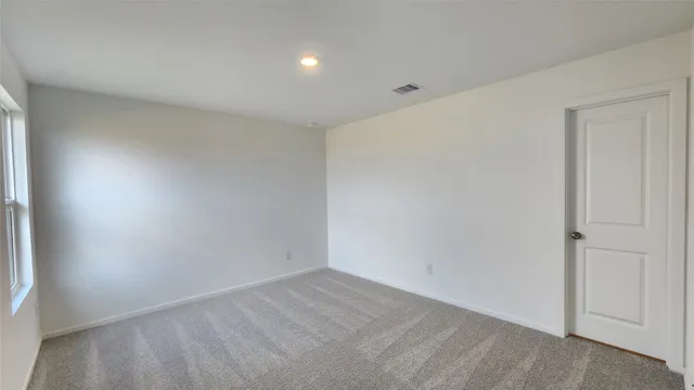 an empty room with window