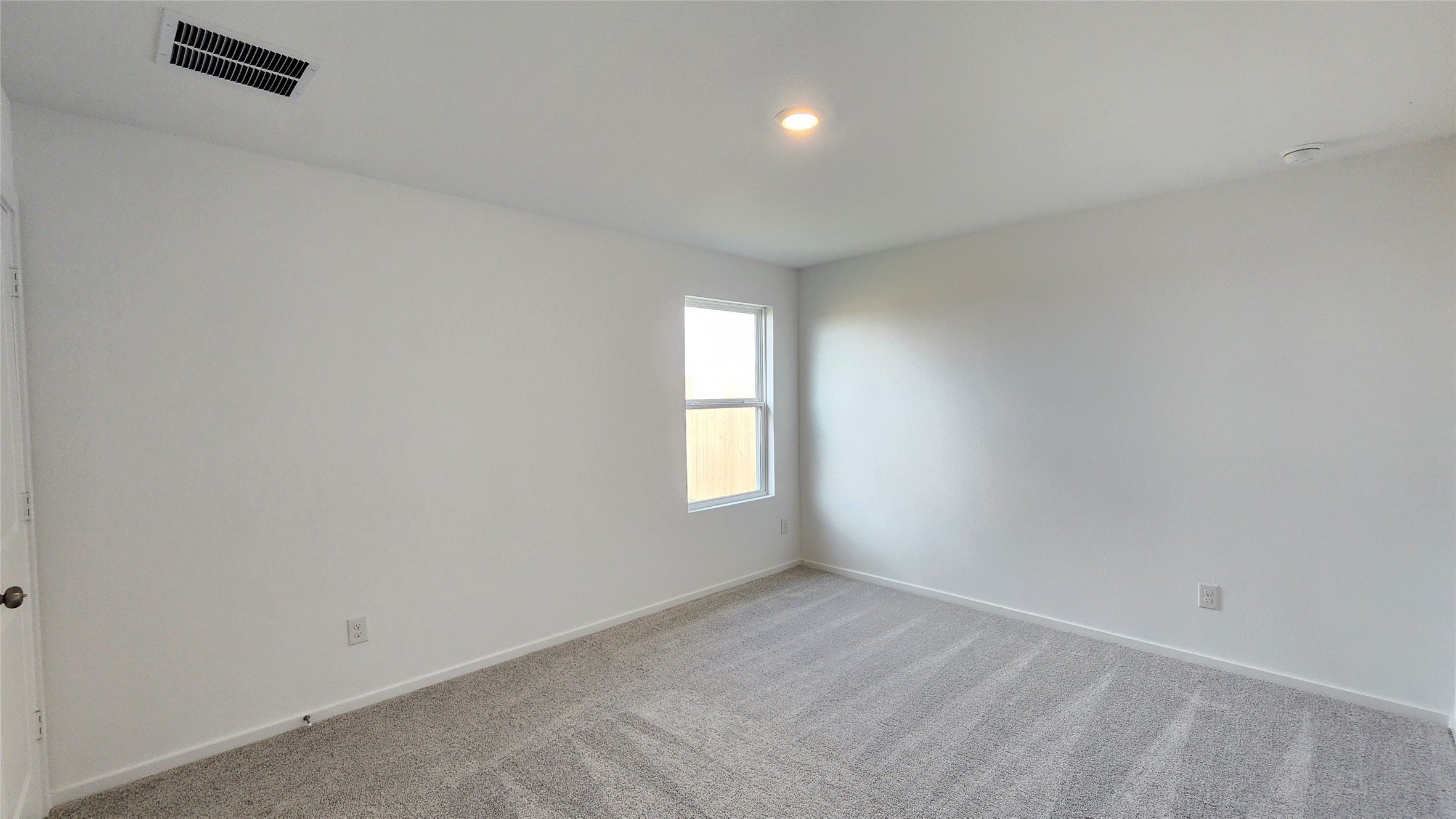 26850 Cascade Sunrise Street Katy, TX 77493 - Photo 11 of 40 an empty room with window