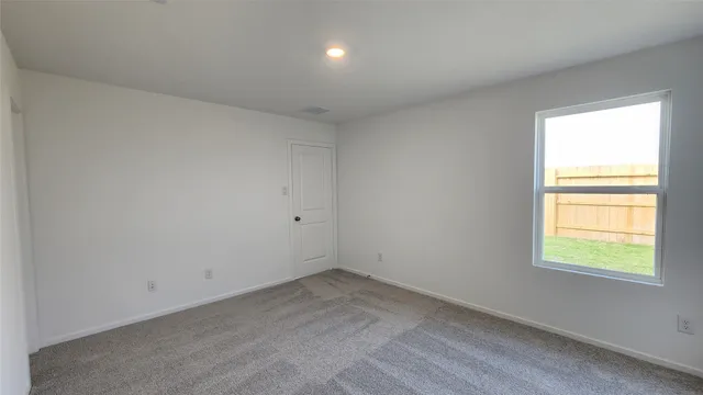 a bathroom with a sink double vanity and a mirror