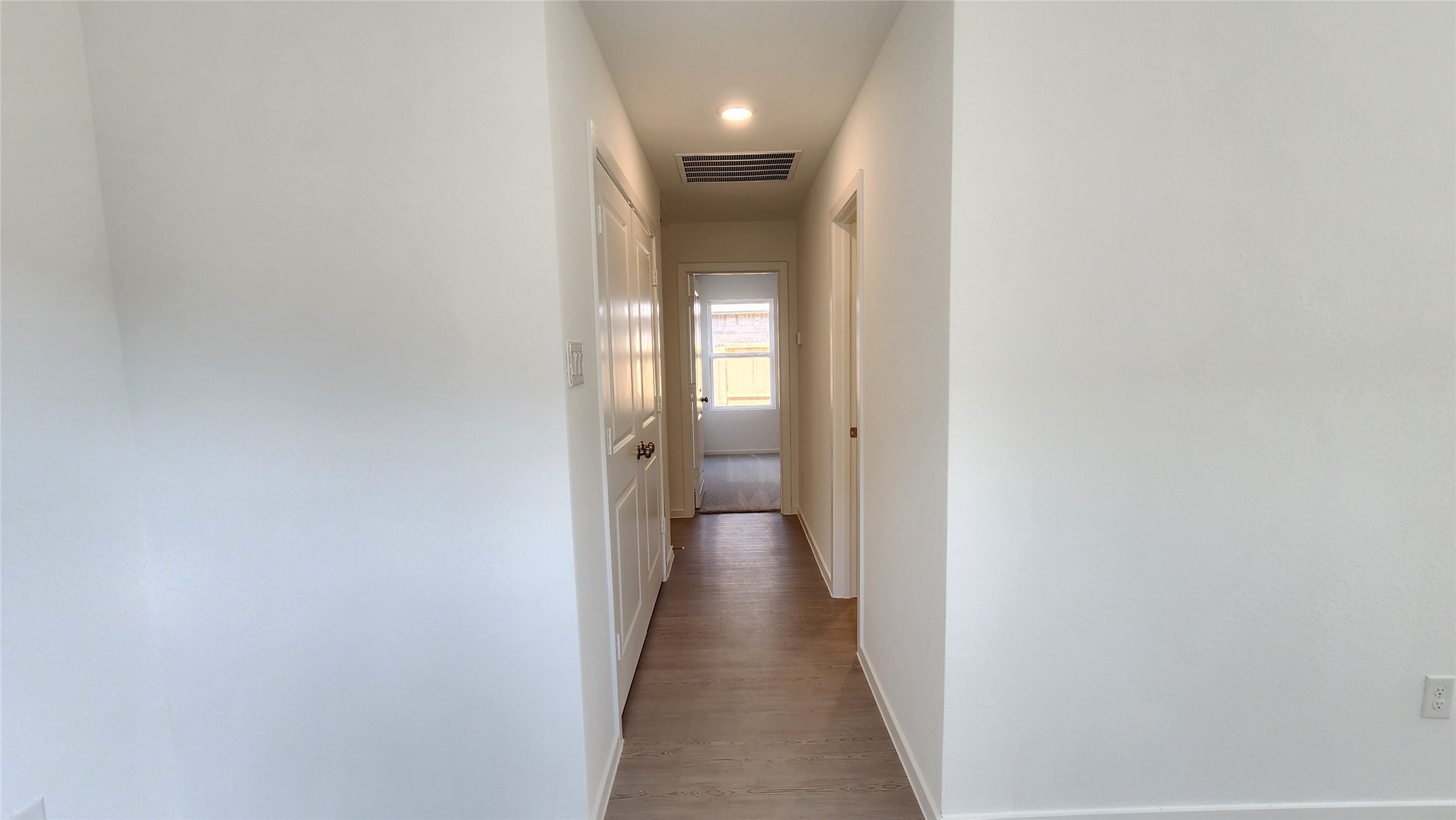 26850 Cascade Sunrise Street Katy, TX 77493 - Photo 18 of 40 a view of a hallway with wooden floor