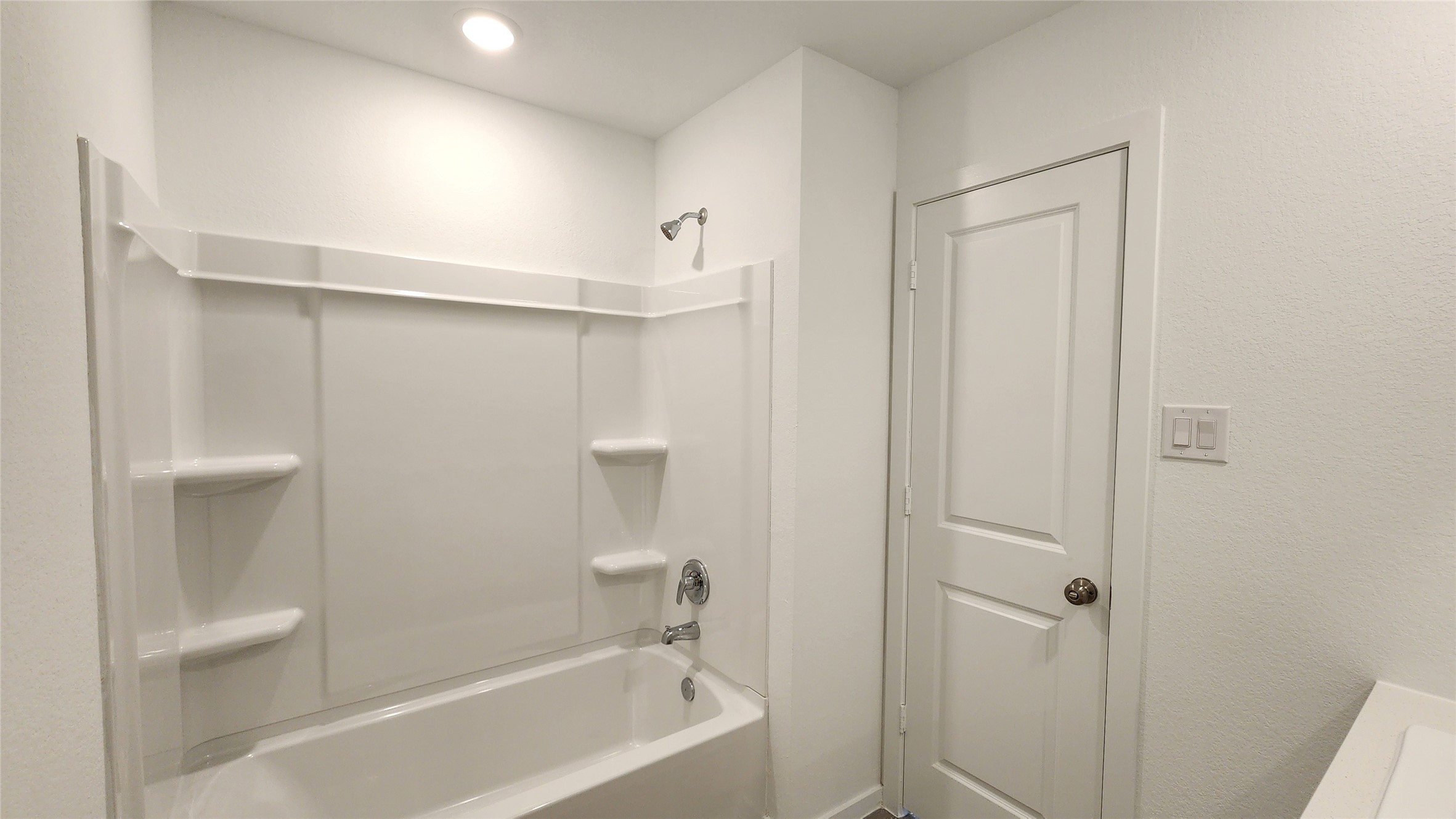 26850 Cascade Sunrise Street Katy, TX 77493 - Photo 22 of 40 a bathroom with a bathtub and a shower