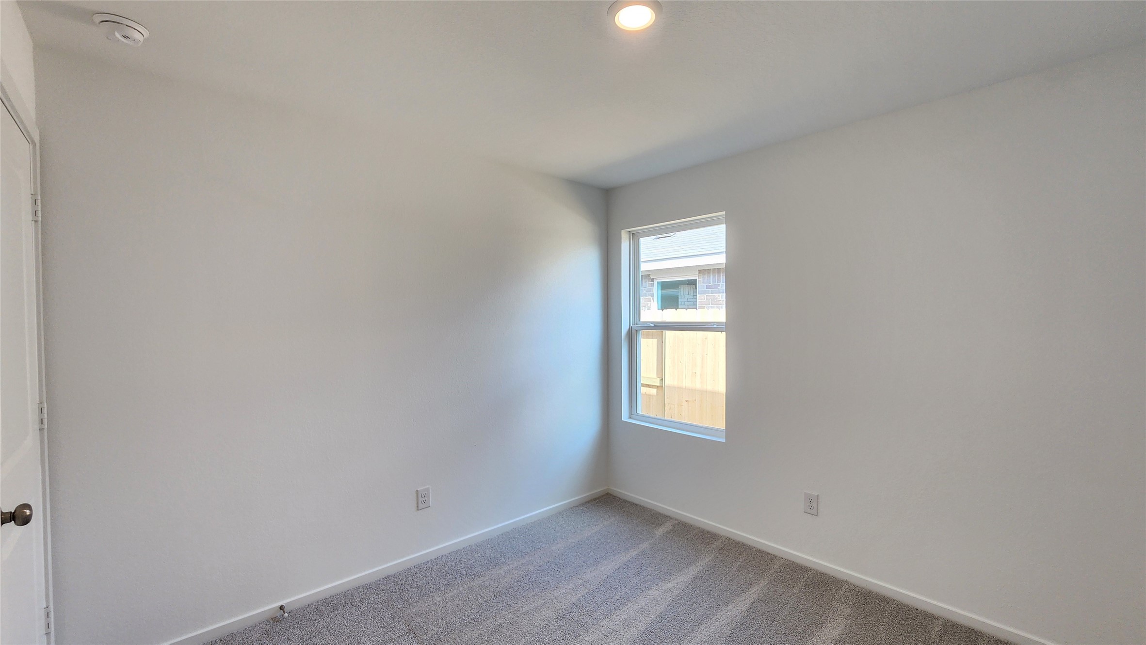26850 Cascade Sunrise Street Katy, TX 77493 - Photo 27 of 40 a view of an empty room with a window and closet area