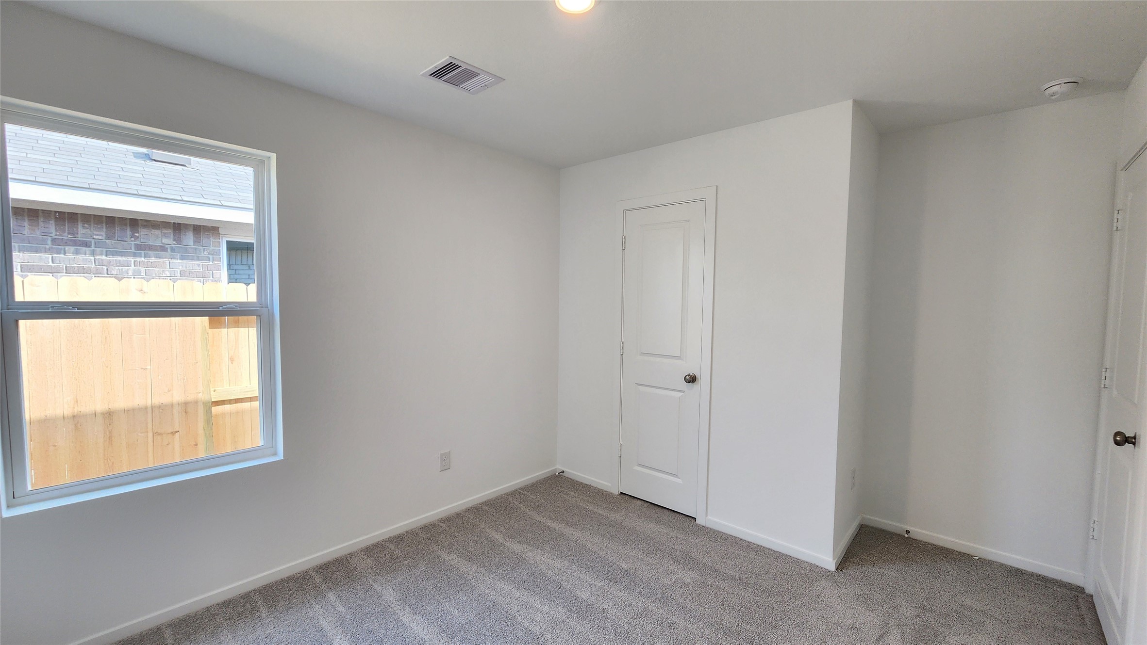 26850 Cascade Sunrise Street Katy, TX 77493 - Photo 31 of 40 a view of an empty room with a window