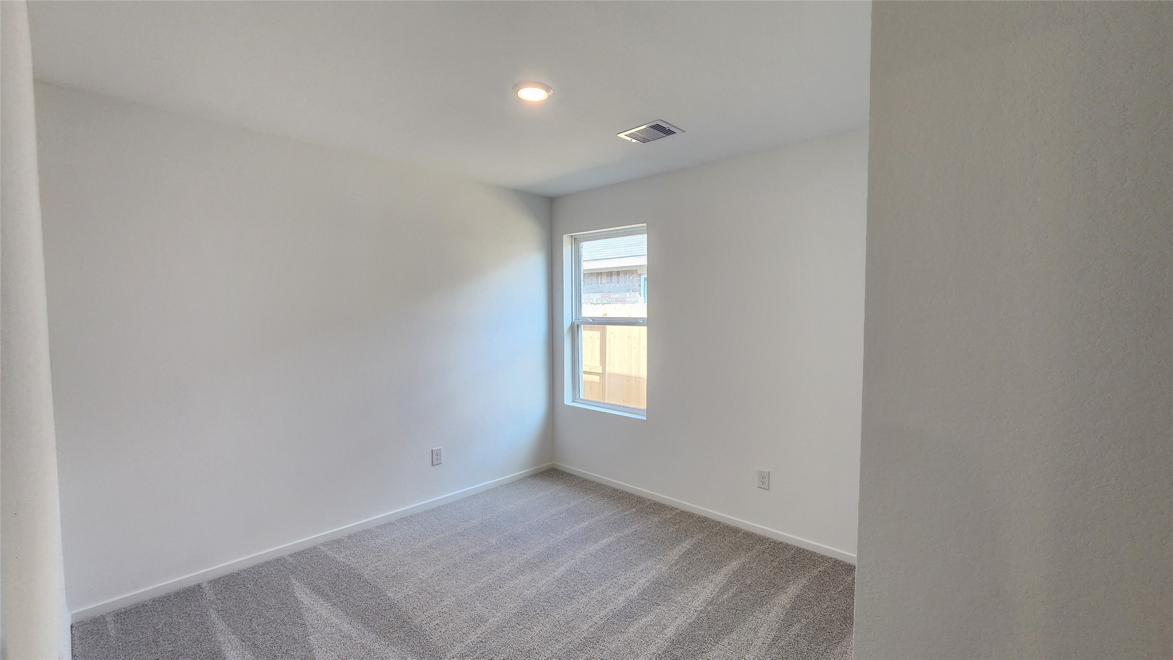 26850 Cascade Sunrise Street Katy, TX 77493 - Photo 32 of 40 a view of an empty room and window